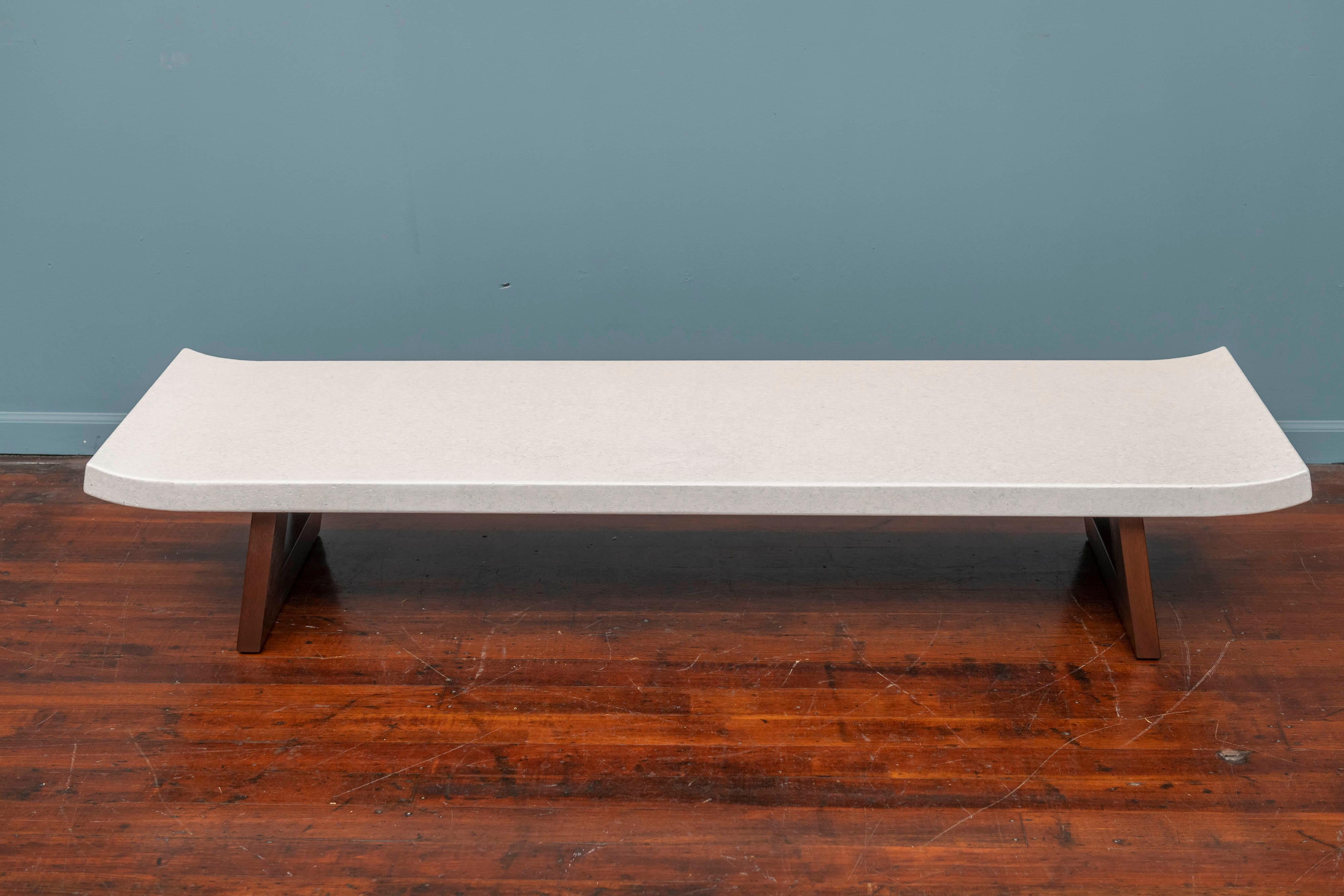 Paul Frankl design for Johnson Furniture co. cork top low table or bench, Model 5004. Influenced by Japanese architecture and made with a pierced mahogany base and a cork veneered top.
Perfectly refinished and ready to install.