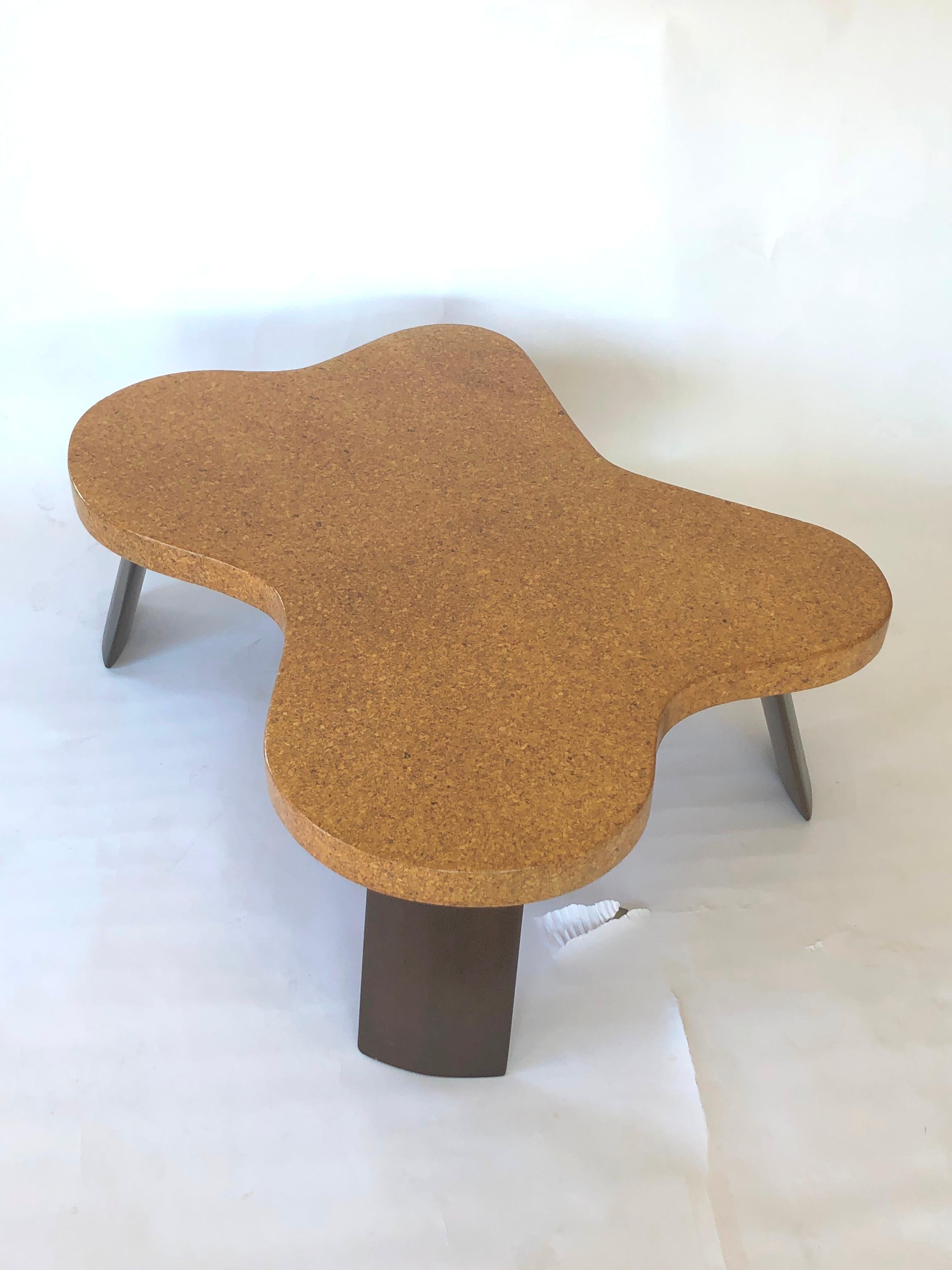 Very unique coffee table by Paul Frankl, Model 5005, numbered on the underside, USA, circa 1950. Original natural cork and mahogany legs.