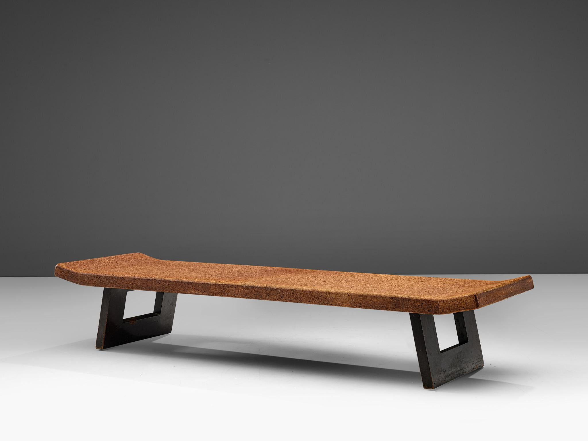 Paul Frankl for Johnson Furniture Company, coffee table, cork and mahogany, United States, circa 1950.

A coffee table inspired by the long, low Asian furniture style, executed with a bleached cork tabletop and mahogany legs. In 1949 Frankl