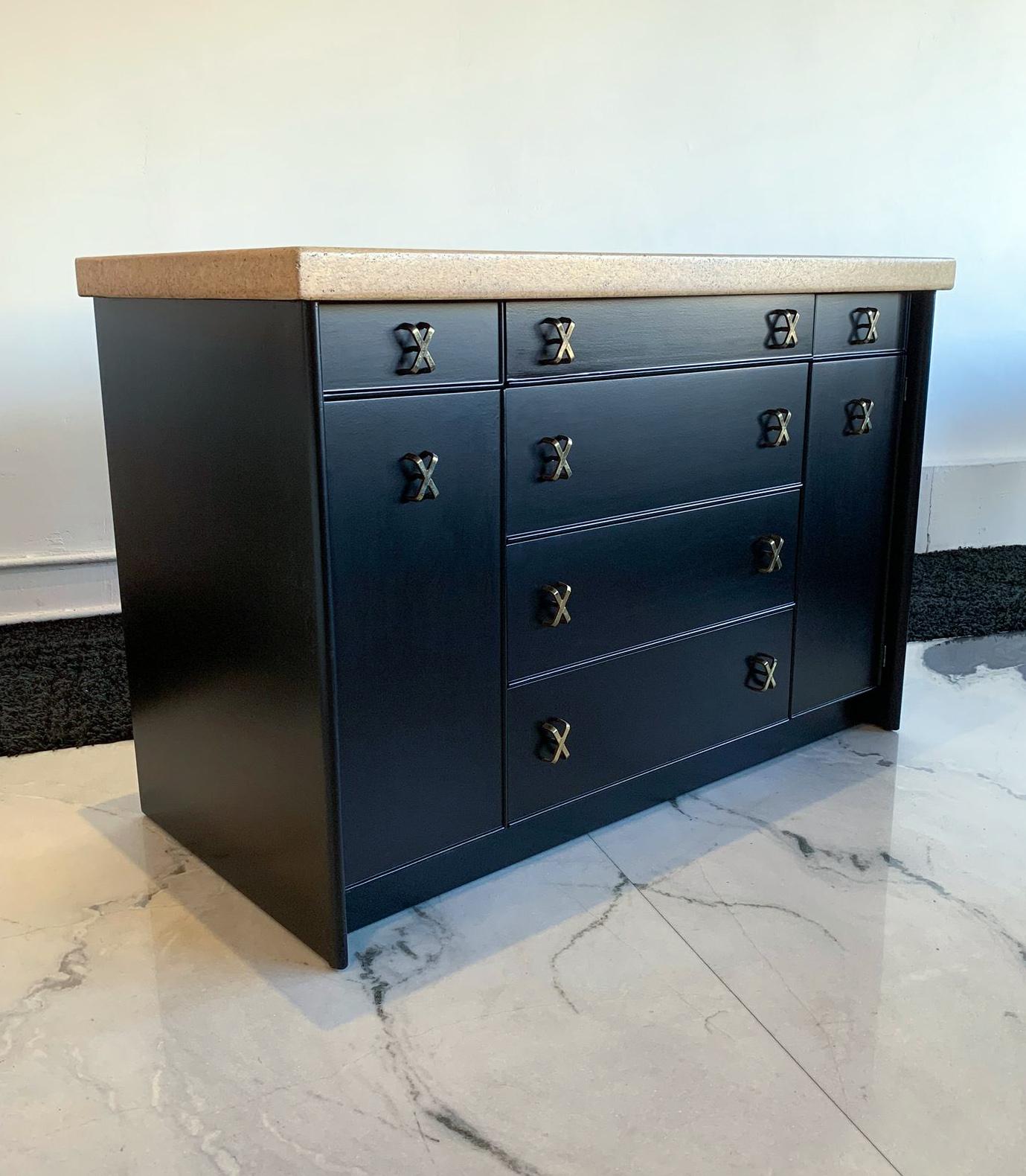 These pieces are absolutely stunning! Professionally restored, this Paul Frankl for Johnson Furniture, distributed by John Stuart sideboard cabinet with matching hutch top is incredibly rare and strikingly beautiful.

These Paul Frankl pieces