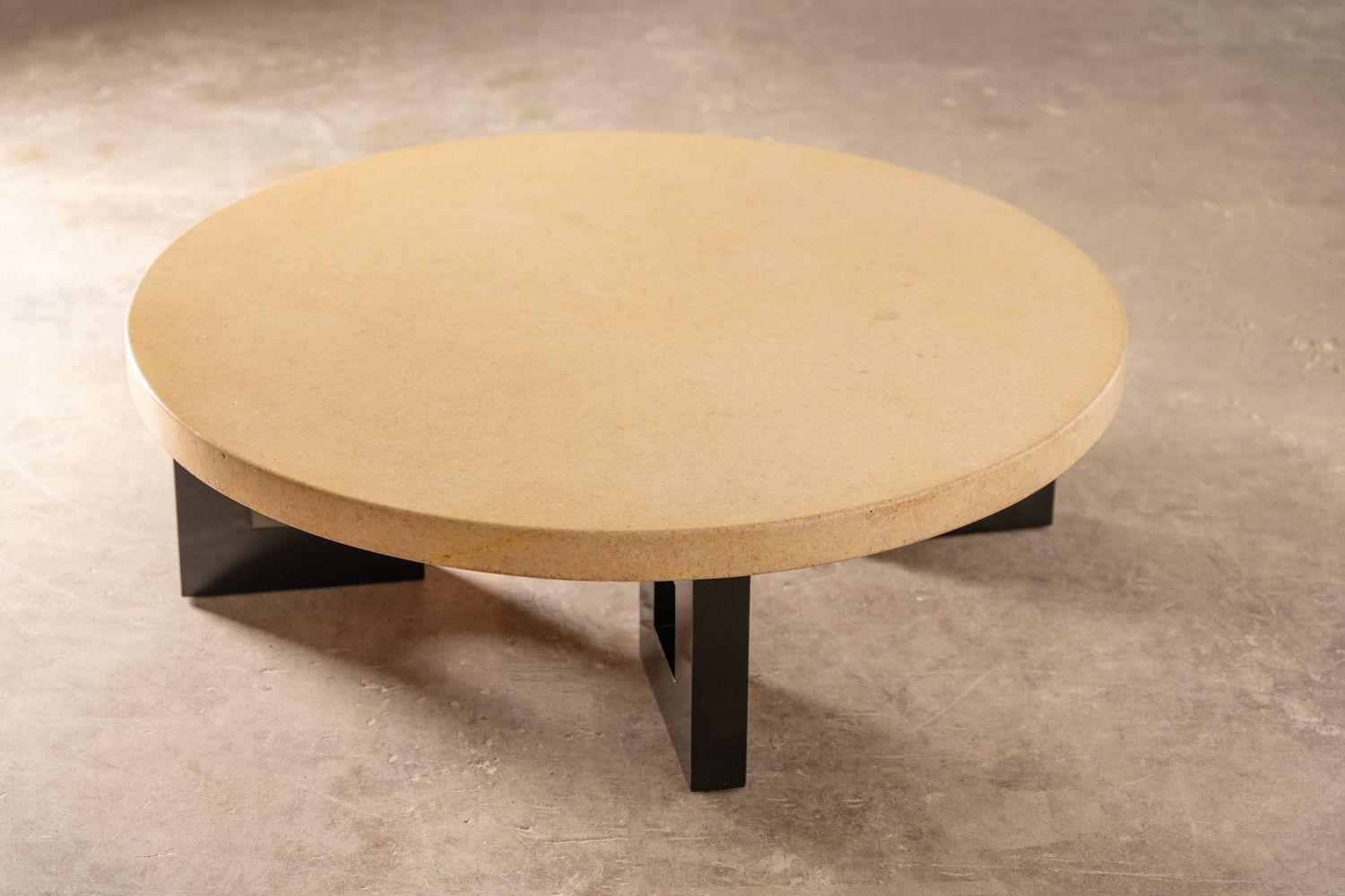 Large-scale round cork top coffee table model #5021 designed by Paul Frankl for the Johnson Furniture Company. The table features four bold square contrasting legs in solid mahogany with the original dark espresso finish. The top retains the