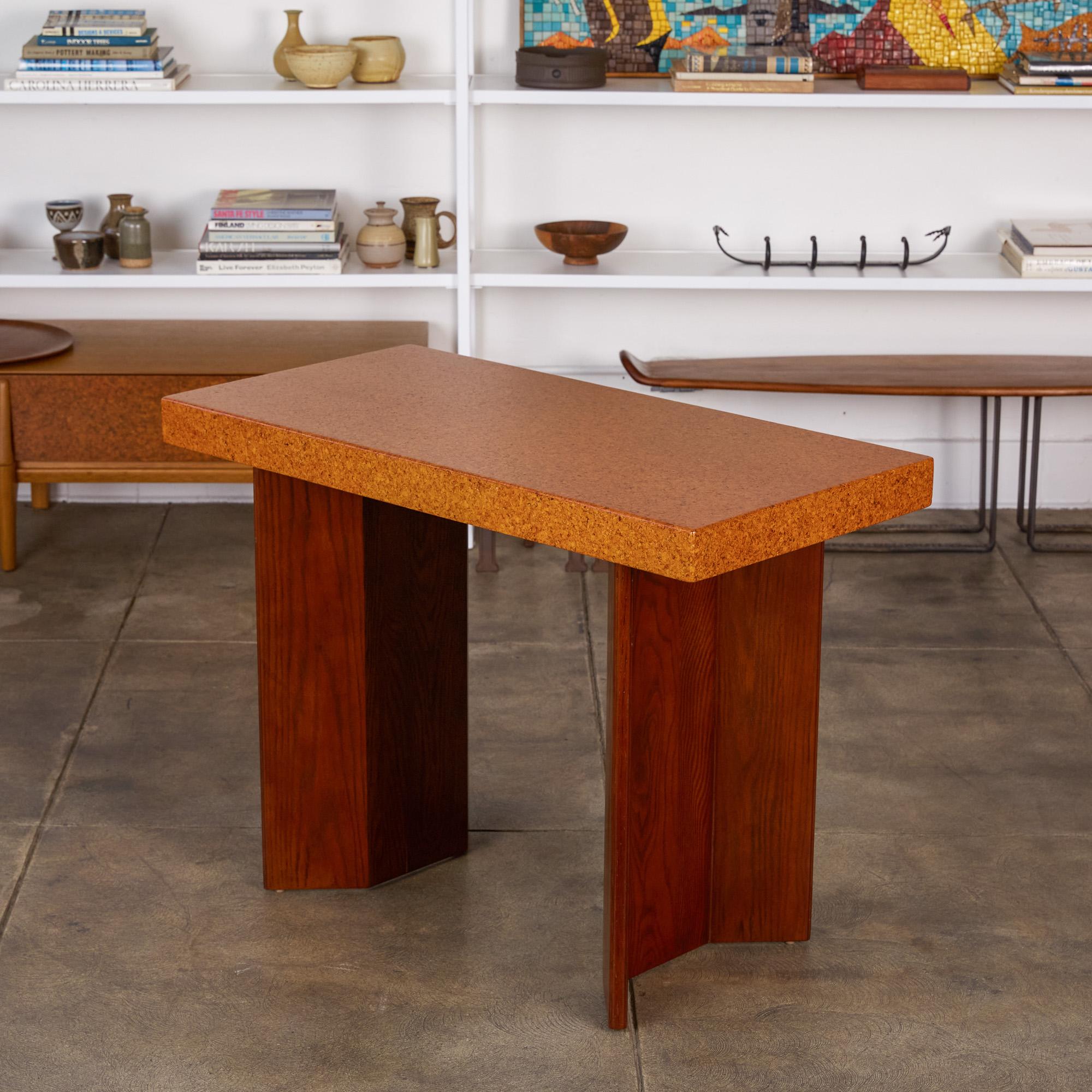 Paul Frankl’s cork furniture pieces are among his longest lasting contributions to American modernism- and are highly sought after to this day. This cork top console table designed for and produced by Johnson Furniture Co has gone through a full