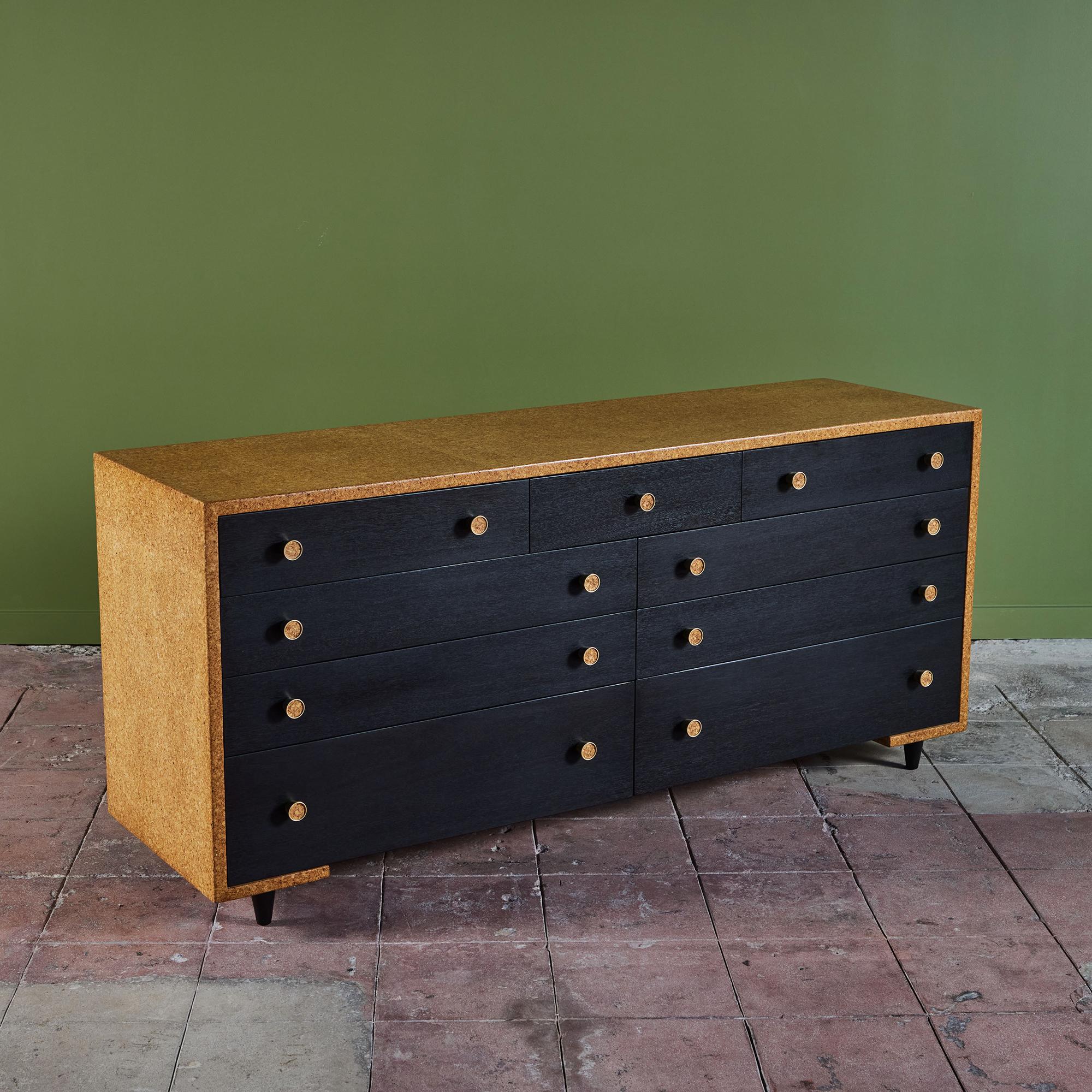 Paul Frankl’s cork furniture pieces are among his longest-lasting contributions to American modernism and are highly sought after to this day. This example, a cork top waterfall edge dresser designed for and produced by Johnson Furniture Co has gone
