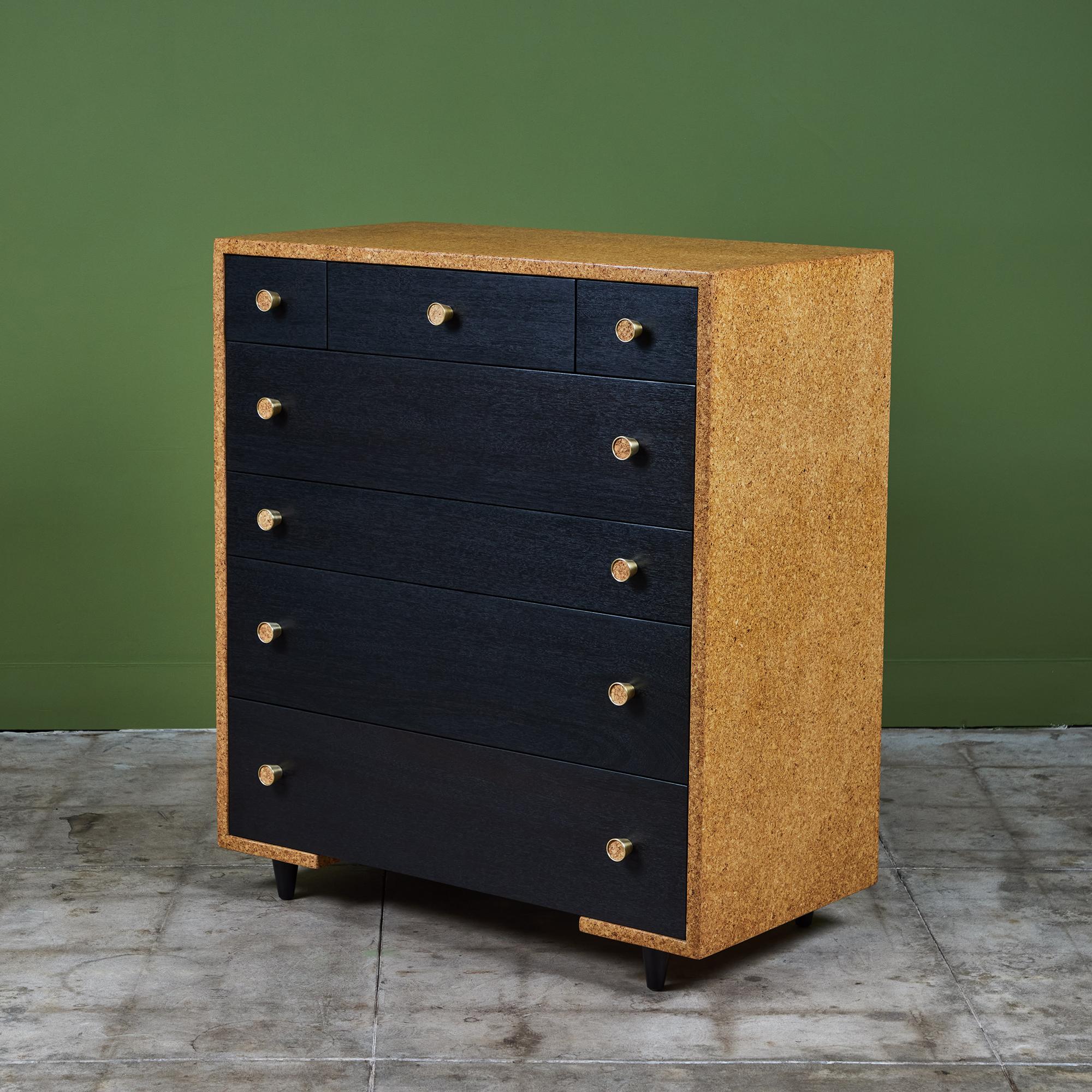 Paul Frankl’s cork furniture pieces are among his longest-lasting contributions to American modernism and are highly sought after to this day. This example, a cork top waterfall edge highboy dresser designed for and produced by Johnson Furniture Co