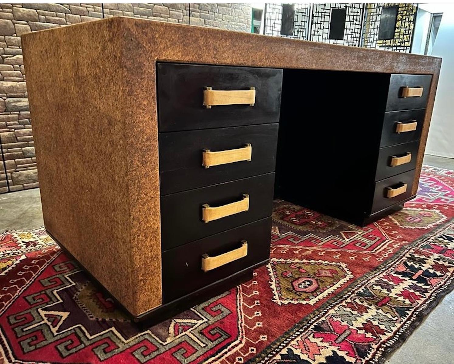 Mid-century modern Paul Frankl cork mahogany desk, with birch handles, circa 1940s for Johnson Furniture, Grand Rapids, MI. 
Dimensions:60