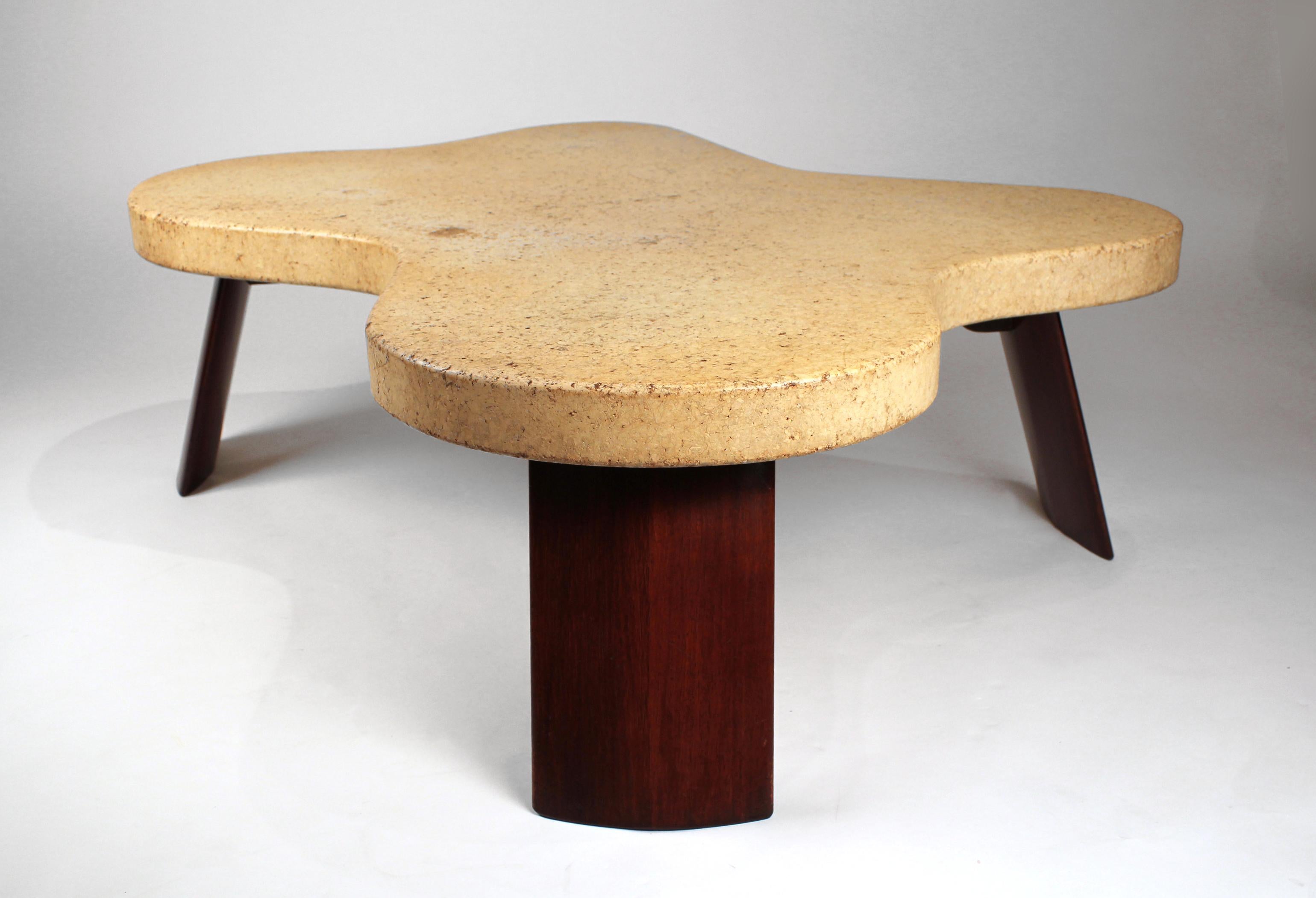 Rare Paul Frankl Amoeba coffee table with solid mahogany legs. In the original finish with lots of original patina.