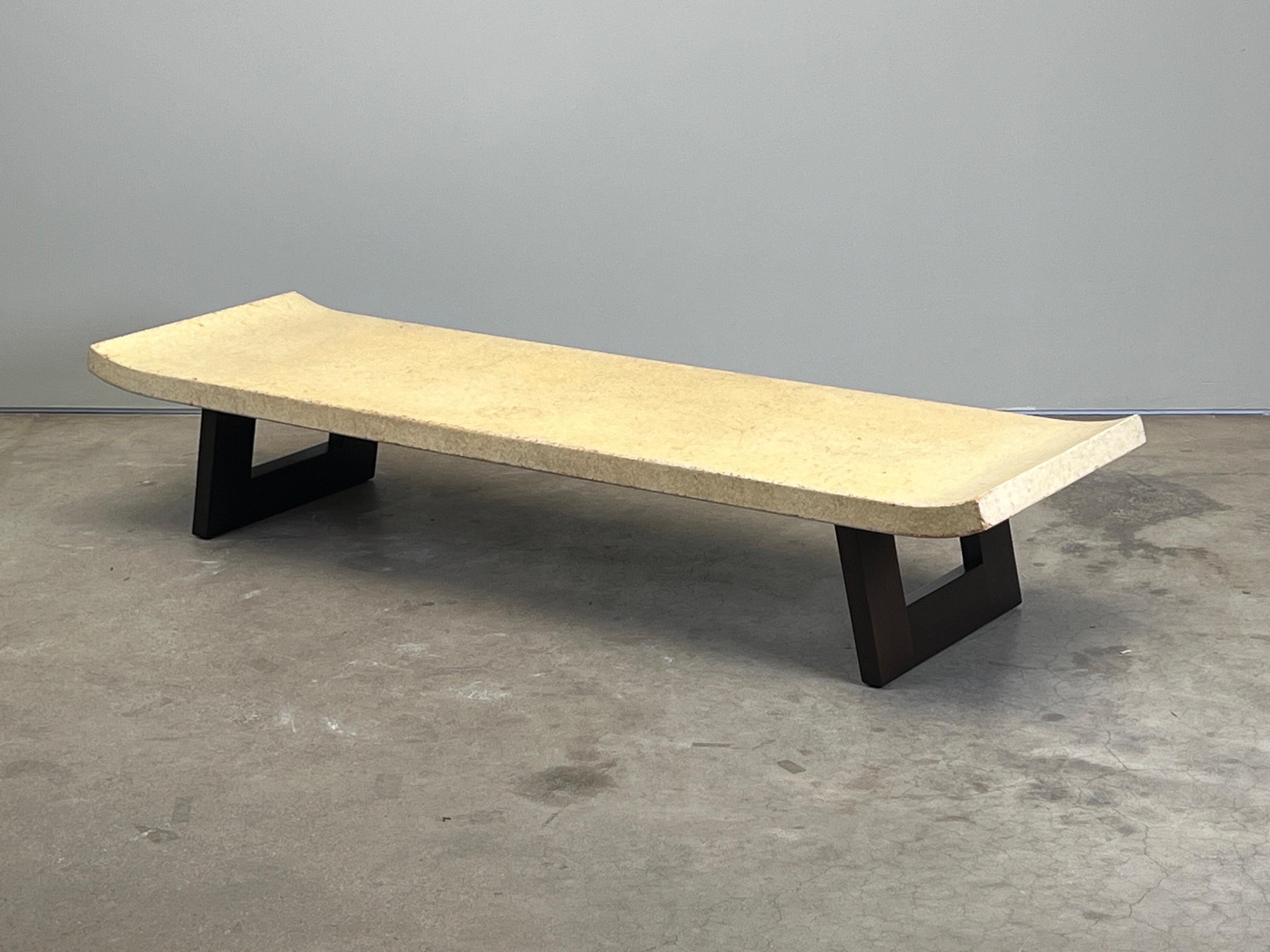 A cork top table with mahogany base designed by Paul Frankl for Johnson furniture. 