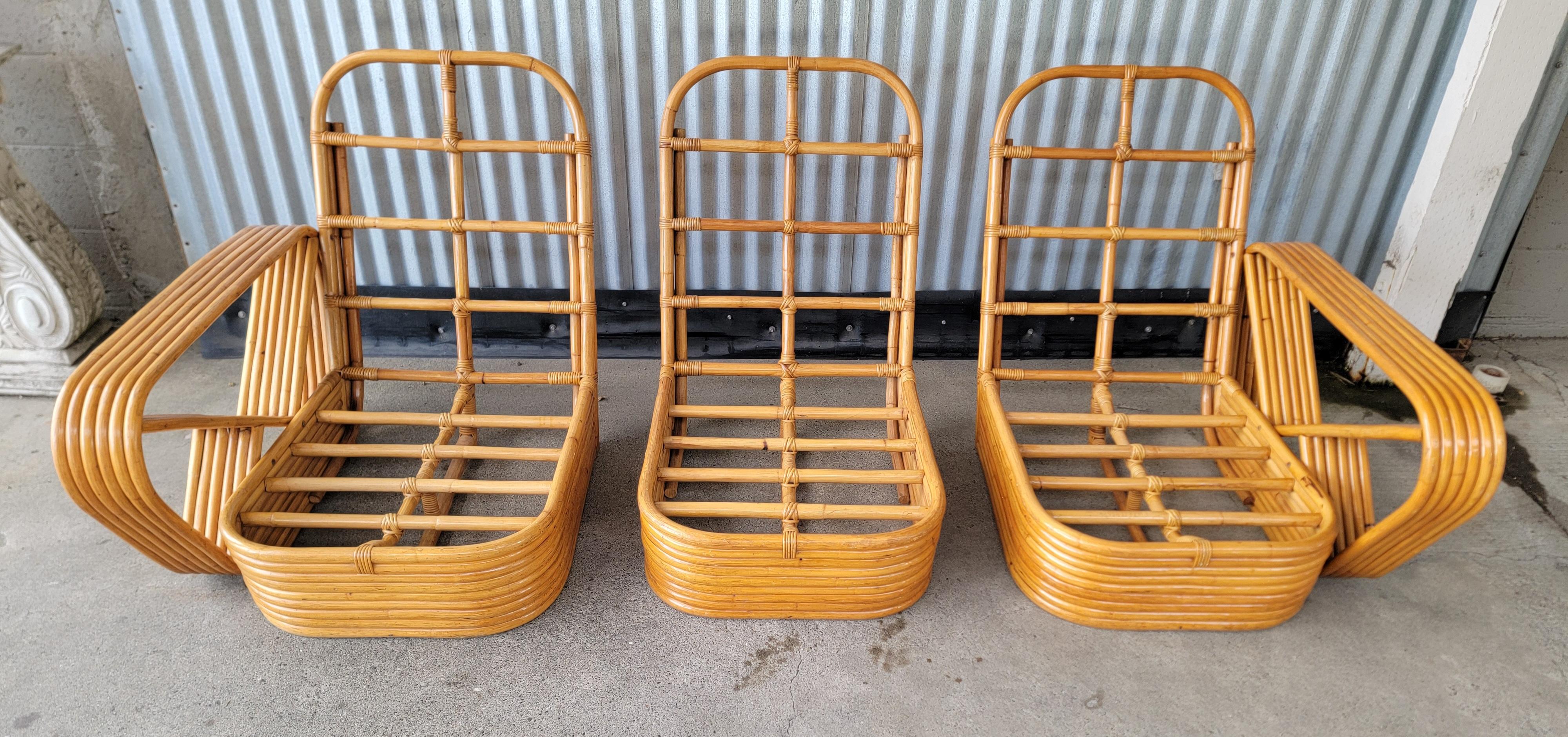 A mid 20th century 3 piece bamboo pretzel arm sofa designed in the manner of Paul Frankl. Circa. 1950's 60's. Six band arm construction. Excellent original condition with very minor wear from use. All bindings are 100% intact. Structural integrity
