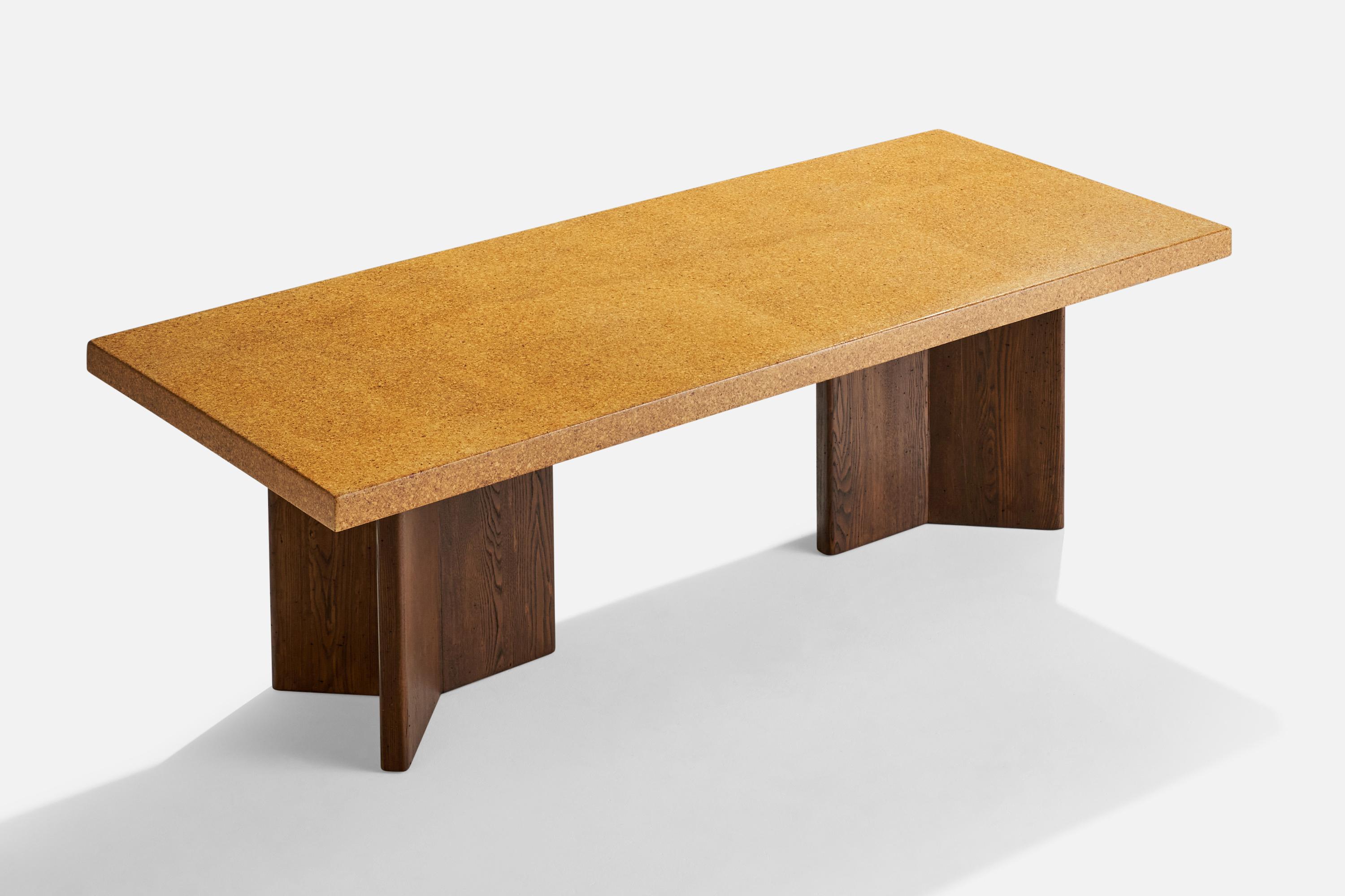A cork and stained mahogany dining table designed by Paul Frankl and produced by Johnson Furniture Company, USA, c. 1940s.