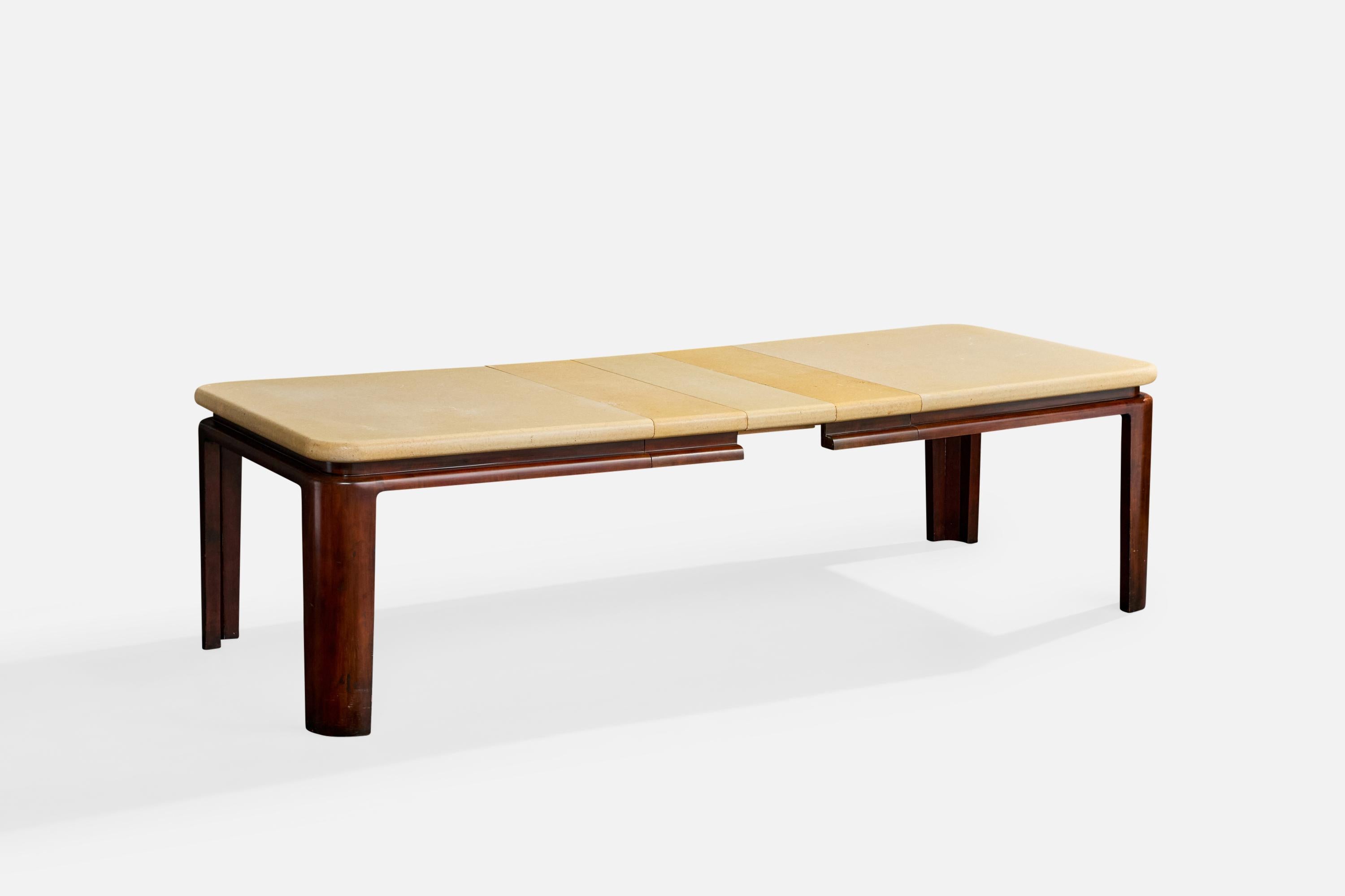 An extendable dark-stained mahogany and lacquered cork dining table designed by Paul Frankl and produced by Johnson Furniture Company, Grand Rapids, Michigan, USA, c. 1950s.

Stated dimensions with all 3 inserts.

Dimensions without Inserts
