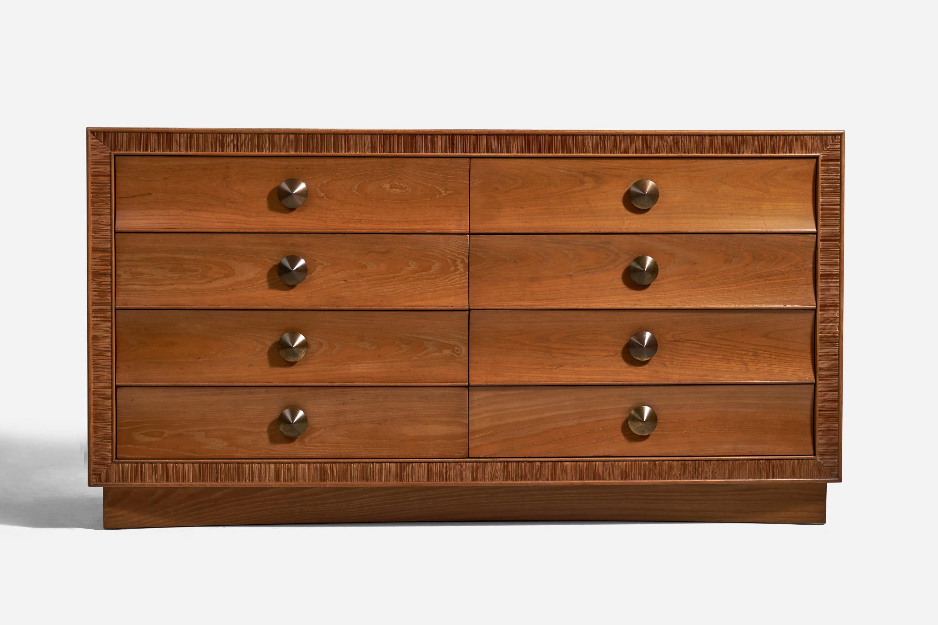 An oak and brass dresser designed by Paul Frankl and produced by Brown Saltman, USA, 1950s.