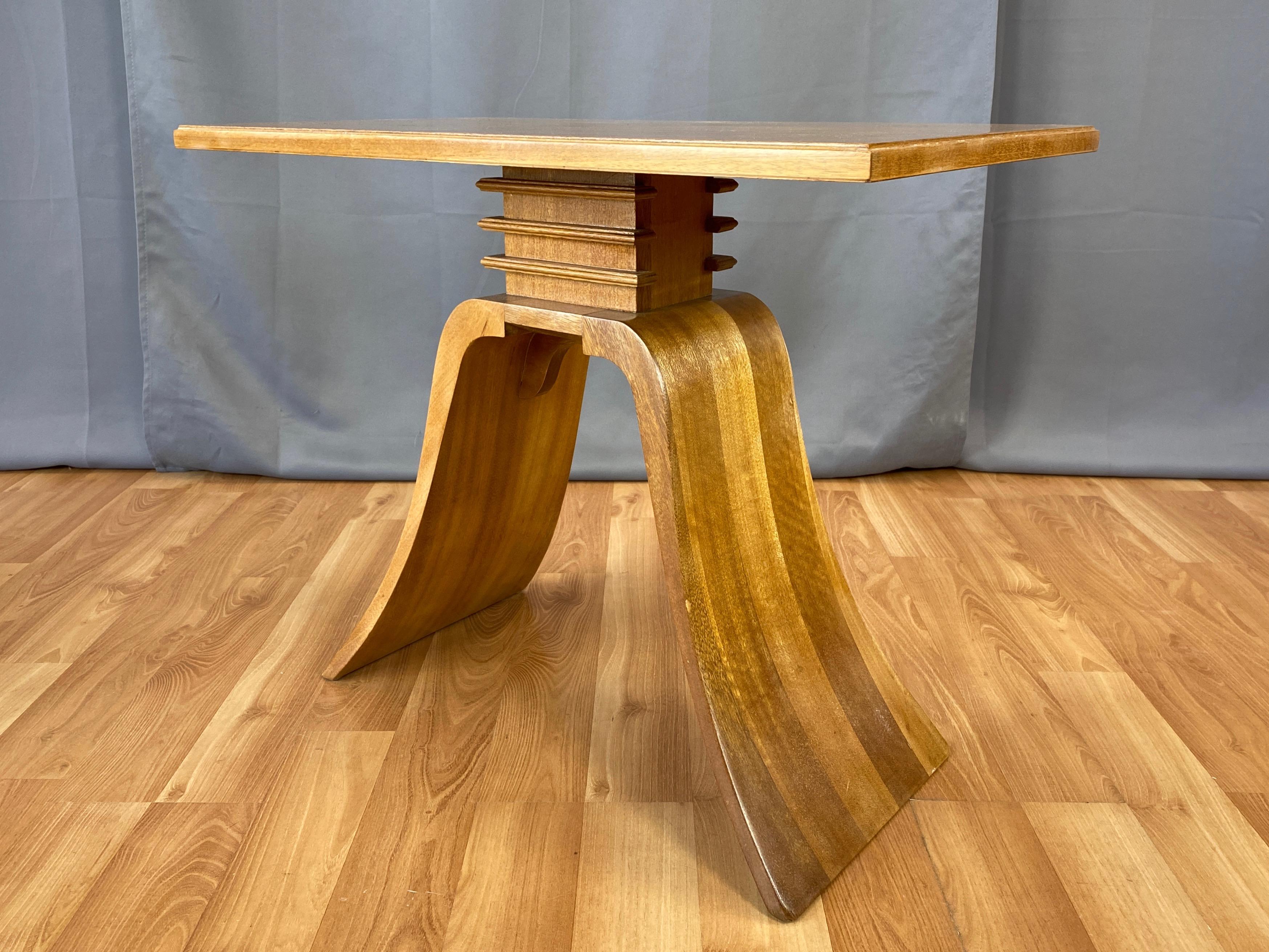 A professionally refinished late 1930s model 8088 end table in blonde ribbon mahogany by Paul Frankl for Brown-Saltman, as pictured in Emily Genauer’s 1939 book “Modern Interiors - Today and Tomorrow”.

Elegant Art Deco design distinguished by a