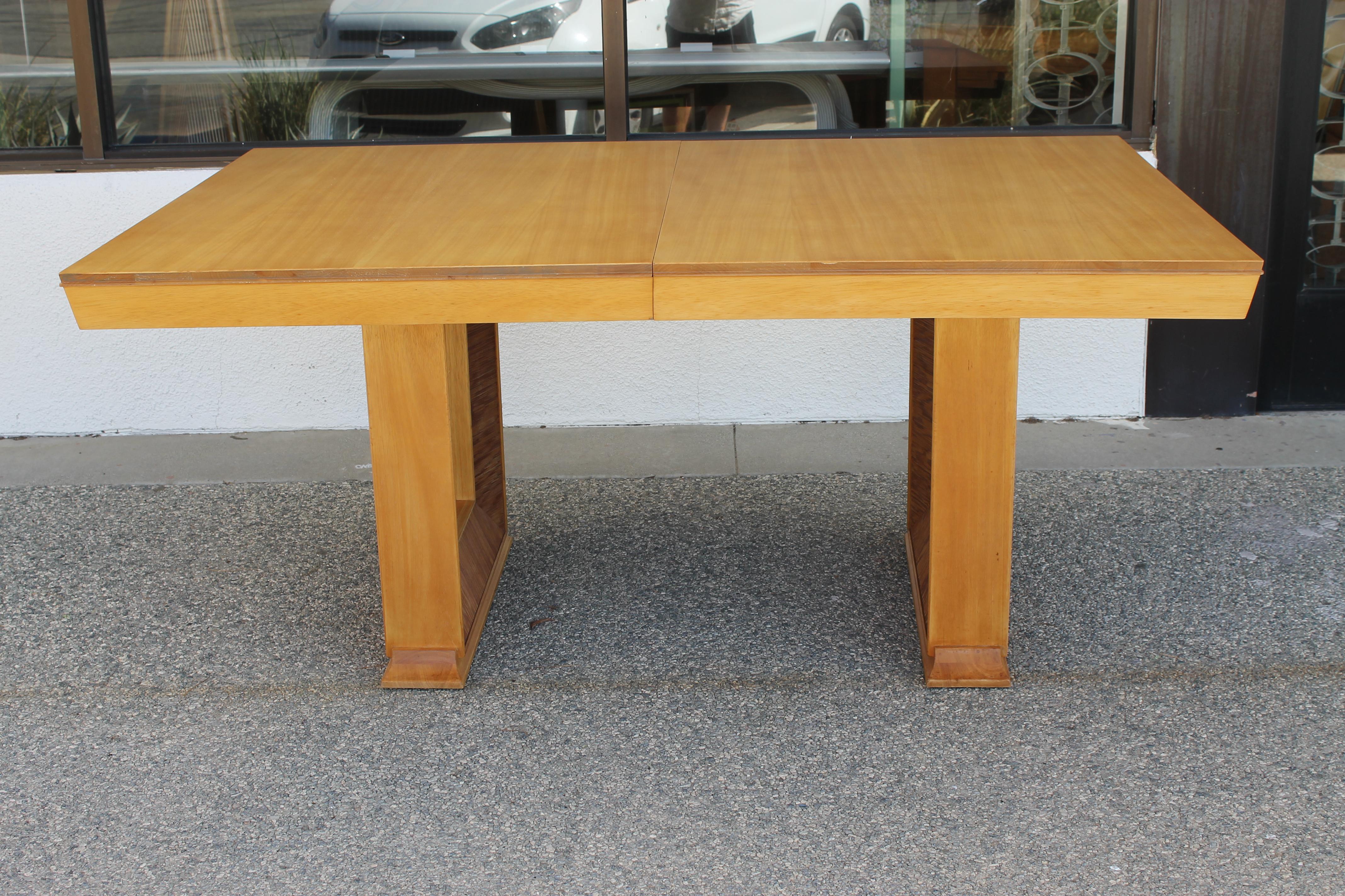 Paul Frankl for Brown Saltman expandable dining table. The rectangular top having (2) 15