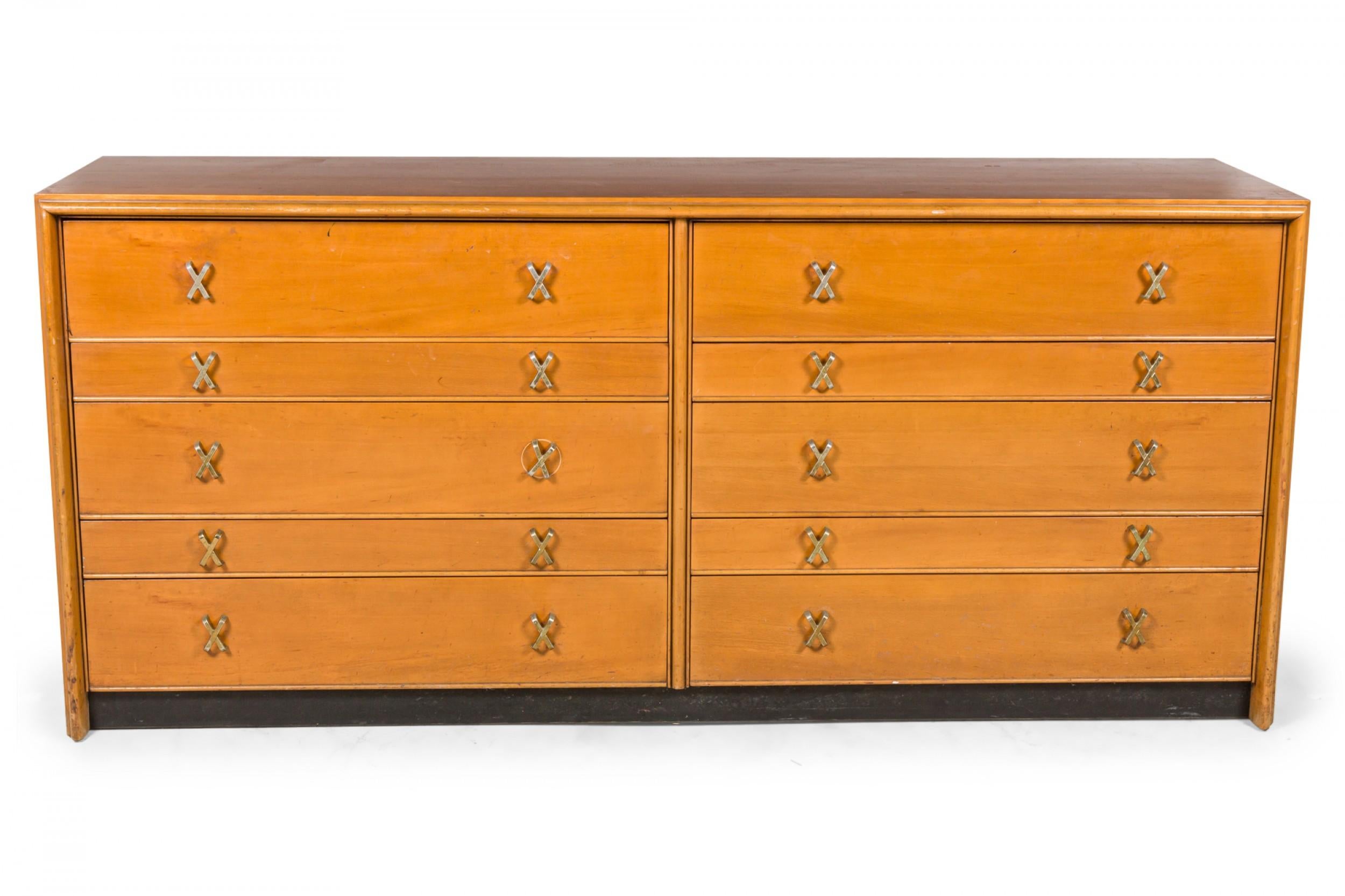 Mid-century walnut low chest / dresser with ten drawers mounted with X-shaped silver metal drawer pulls. (Paul Frankl for Johnson Furniture Co).