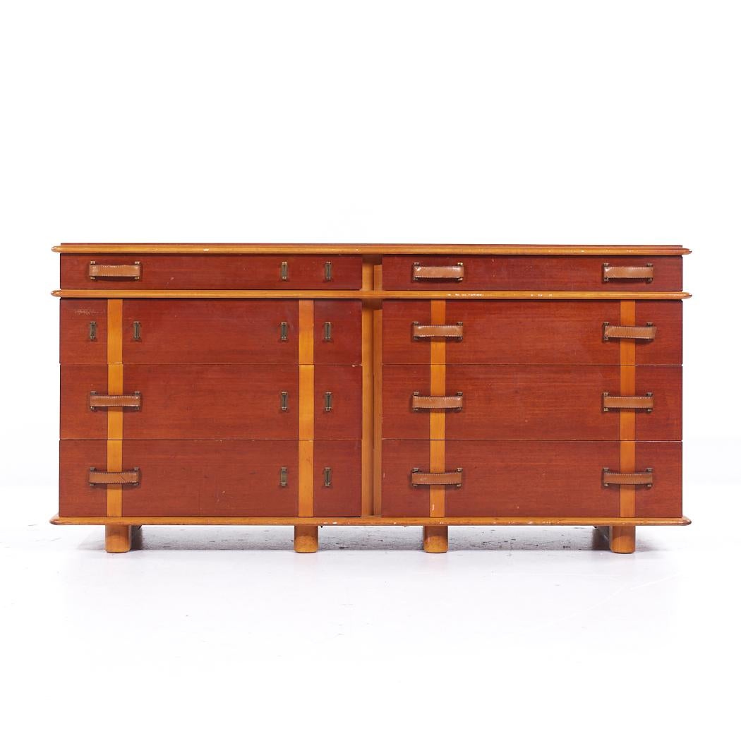 Paul Frankl for Johnson Furniture Mid Century Leather Birch and Maple Station Wagon Dresser

This lowboy measures: 66 wide x 22 deep x 32 inches high

All pieces of furniture can be had in what we call restored vintage condition. That means the