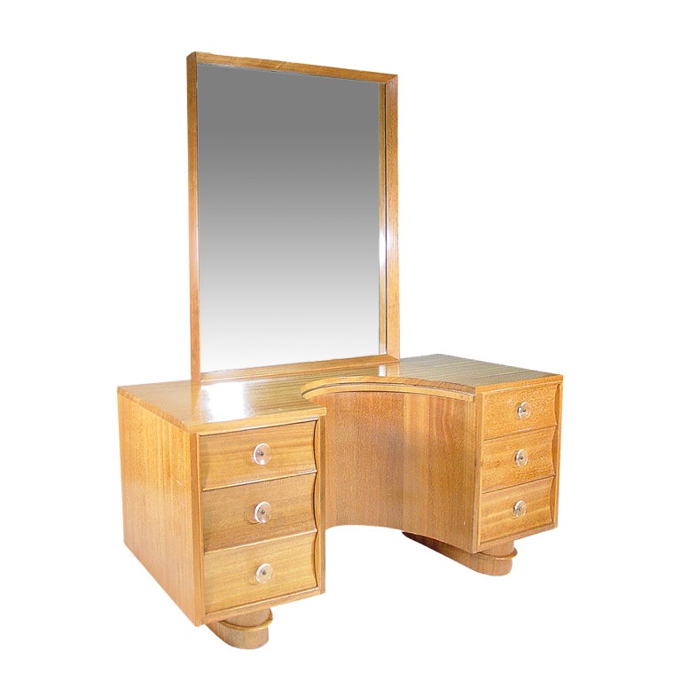 This rare Mid-Century Modern four-piece bedroom set by Paul Frankl for Brown-Saltman includes a vanity, six-drawer highboy and two night stands. Each piece features their original round acrylic drawer pulls, sculpted legs and straight Mid-century