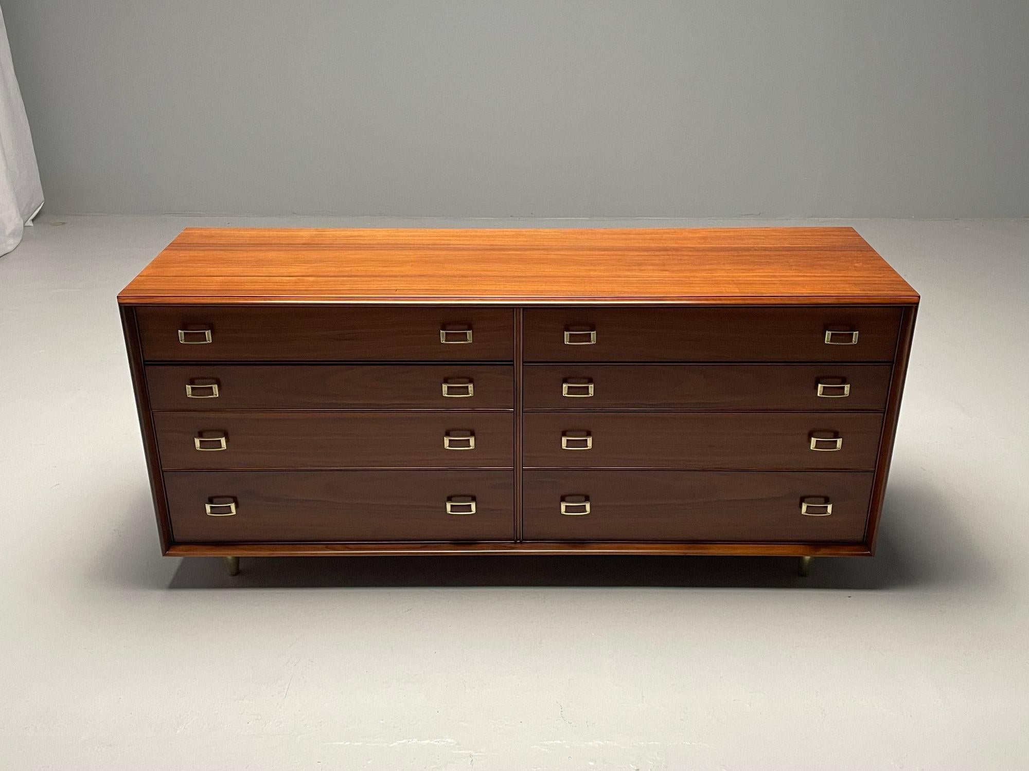 Paul Frankl, John Stuart, Mid-Century Modern, Dresser, Walnut, Brass, USA, 1950s

Fully refinished dresser designed by Paul Frankl for John Stuart. This cabinet has 8 drawers in total, four beside four of graduated heights, with brass drawer pulls.