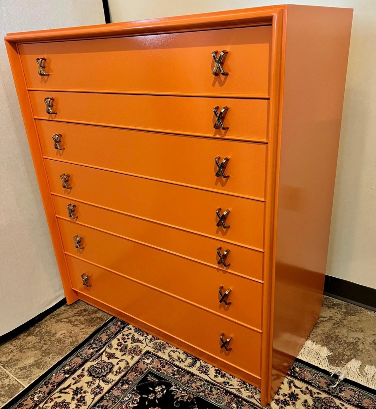 This newly lacquered sophisticated high chest was designed by Paul Frankl for the Johnson Furniture Company, circa late 1940s-early 1950s. The coveted Johnson hallmark is incised inside. It is a prime example of Frankl's mid-century work, which was