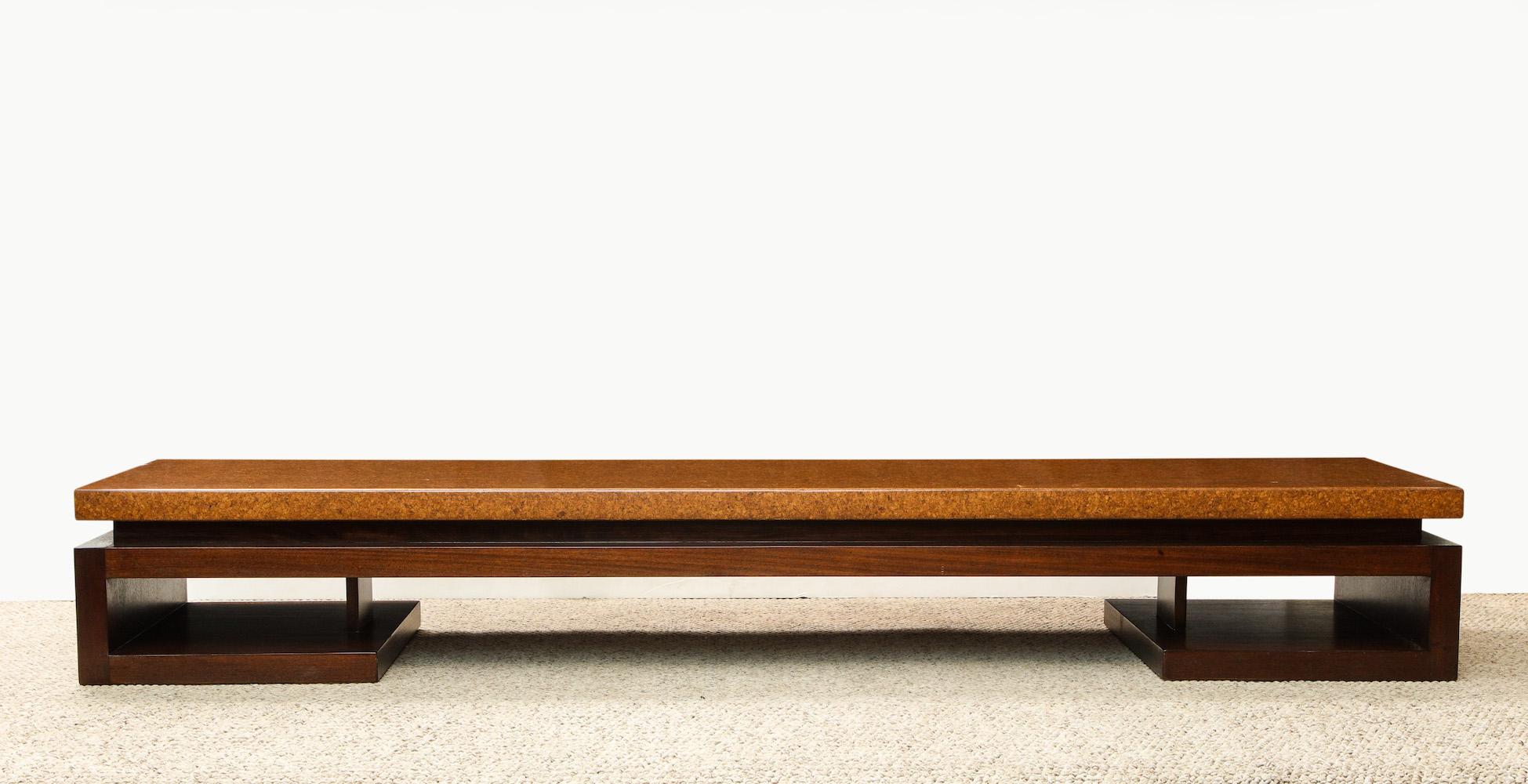 Asian-inspired form with cork-wrapped top above dark-stained mahogany base. This piece is designed by Paul Frankl for Johnson furniture company from the post war period.