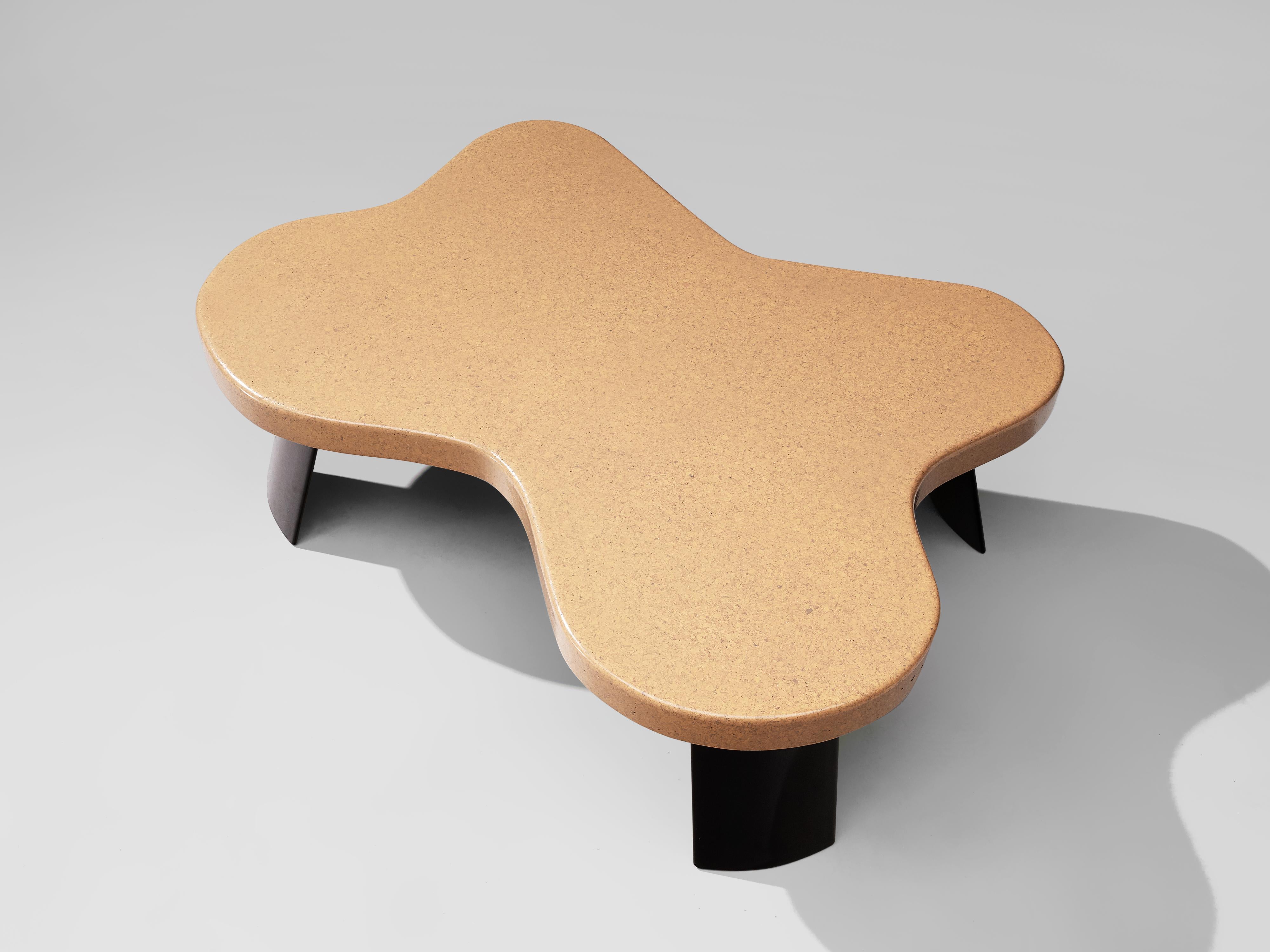 Paul Frankl for Johnson Furniture, coffee table, model 'No 5005', lacquered cork, mahogany, USA, 1950s.

This biomorphic shaped coffee table designed by Paul Frankl has a cork laminated tabletop. The bright tone of the cloud-like designed shape
