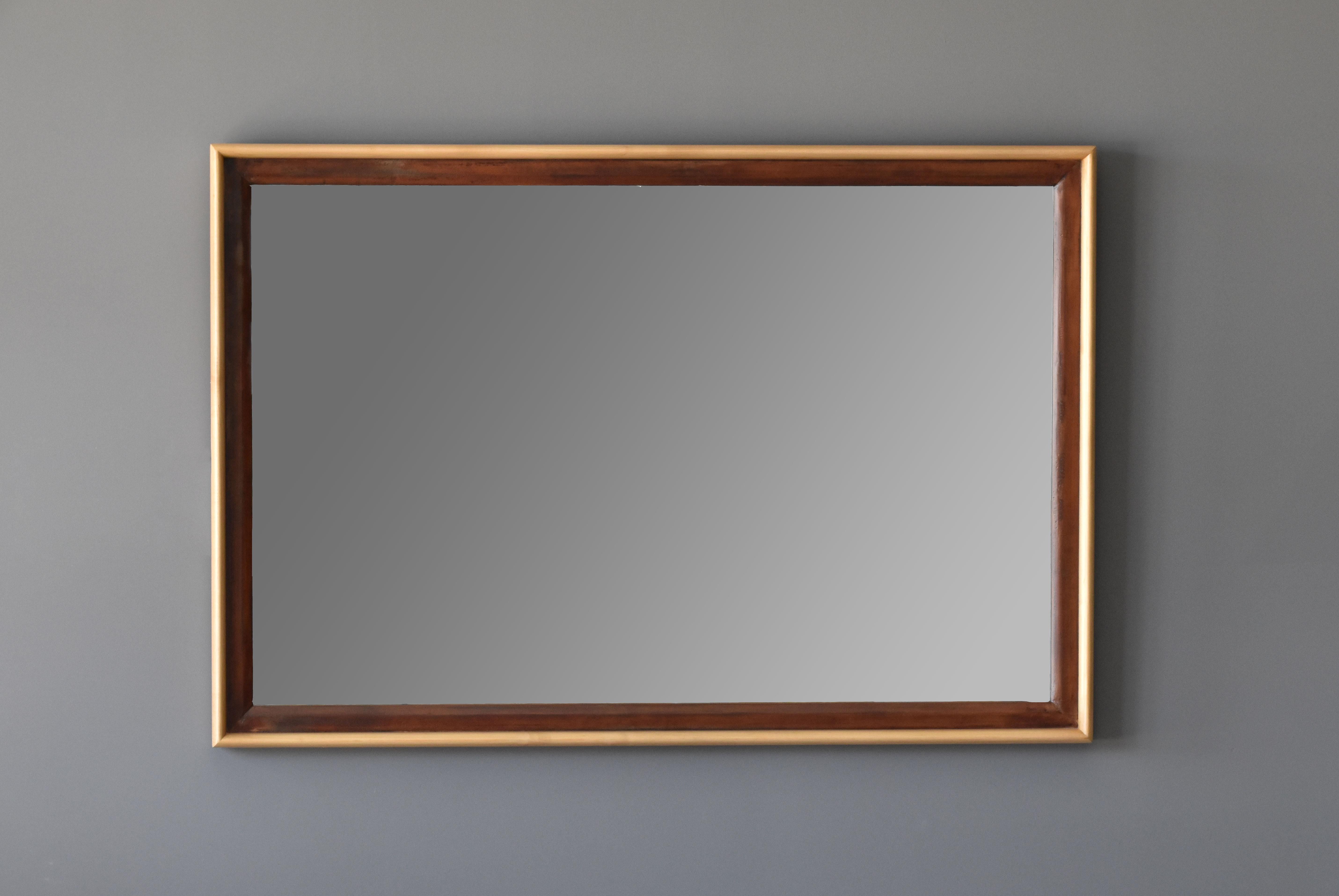 A rare and large mirror from Paul Frankl's iconic 