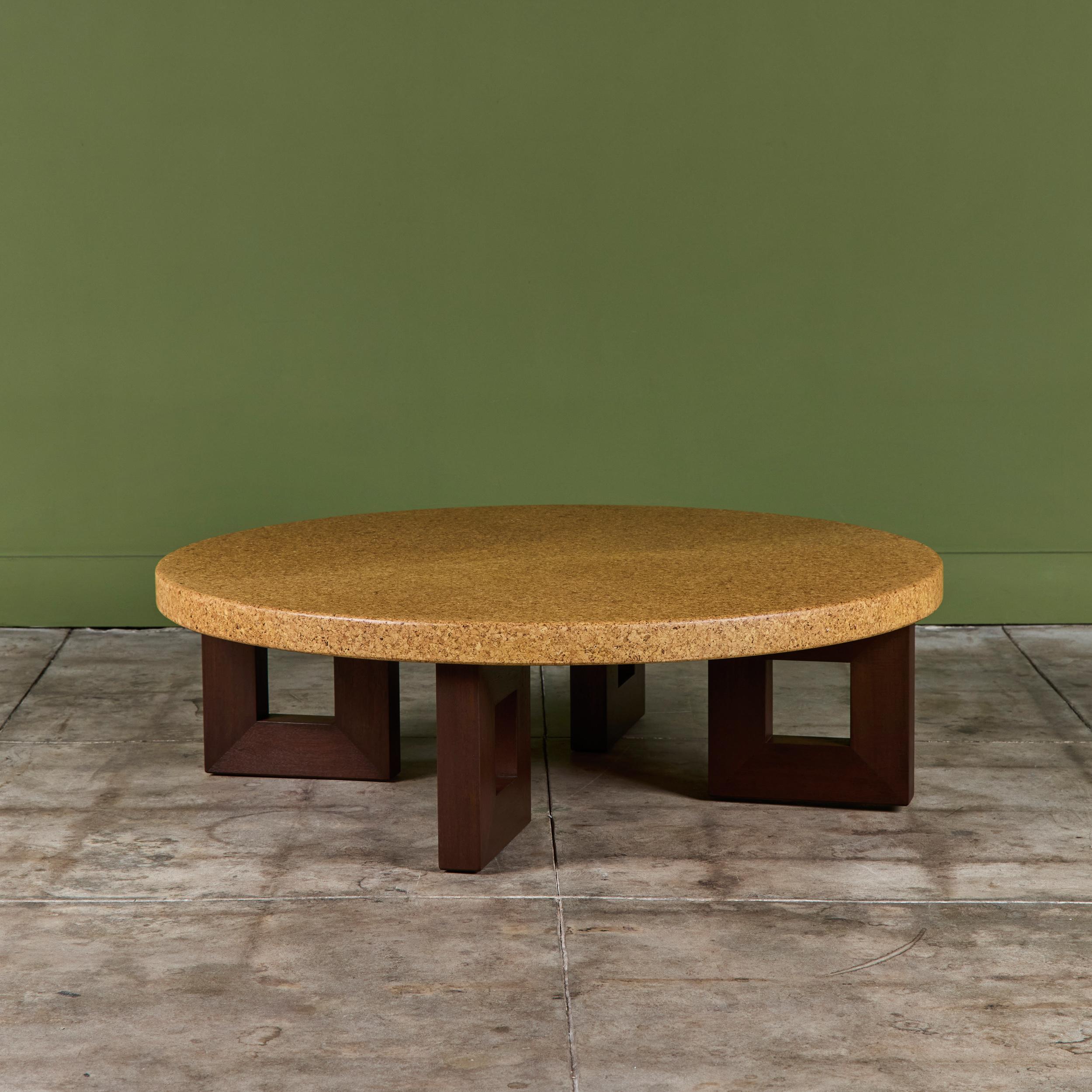 Paul Frankl’s cork furniture pieces are among his longest-lasting contributions to American modernism and are highly sought after to this day. This round cork top coffee table designed for and produced by Johnson Furniture Co has gone through a full