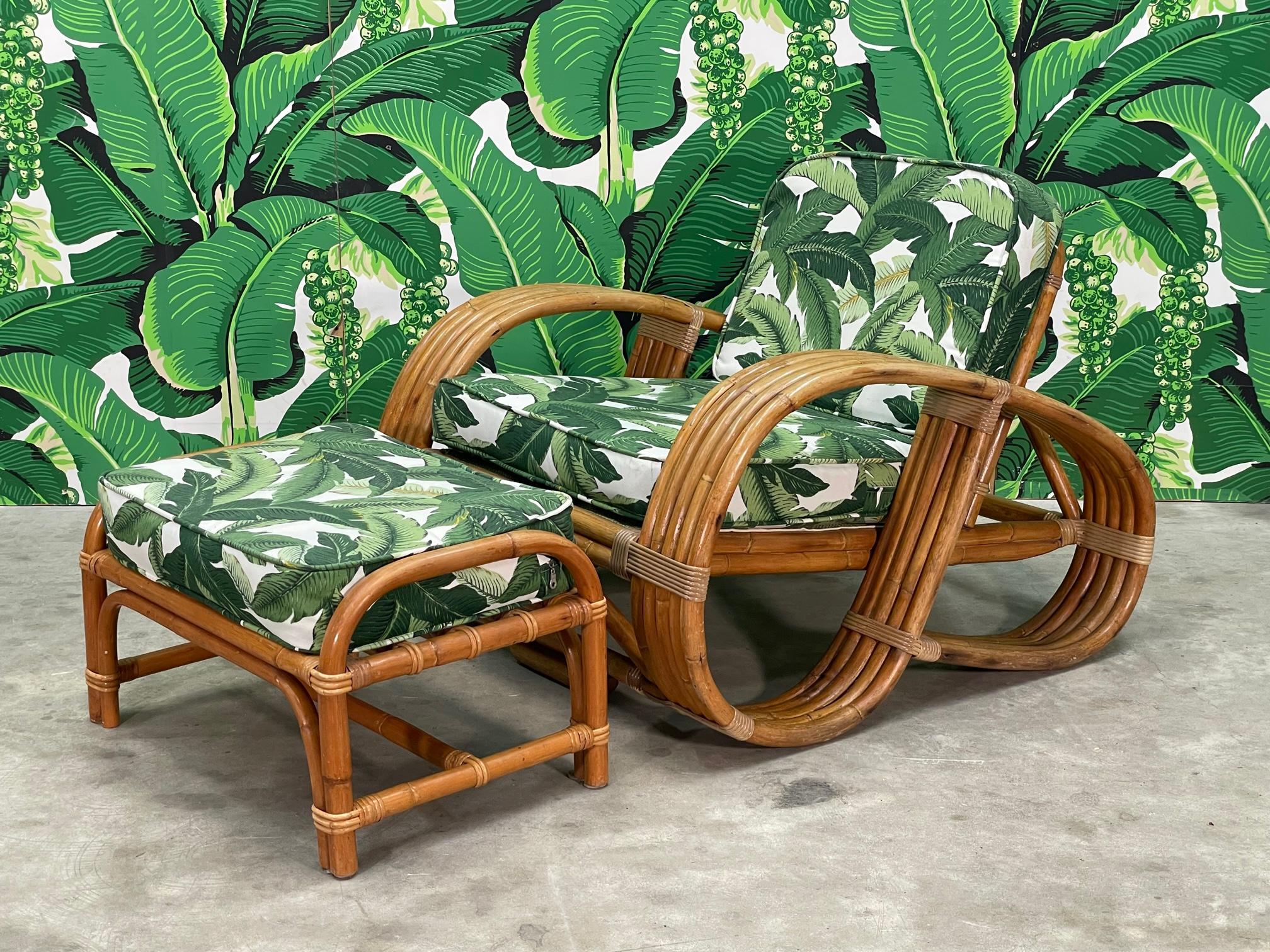 Vintage rattan lounge/club chair and ottoman in the manner of Paul Frankl features a five strand design and new palm leaf upholstery. Matching ottoman included. Good condition with imperfections consistent with age, see photos for condition details.