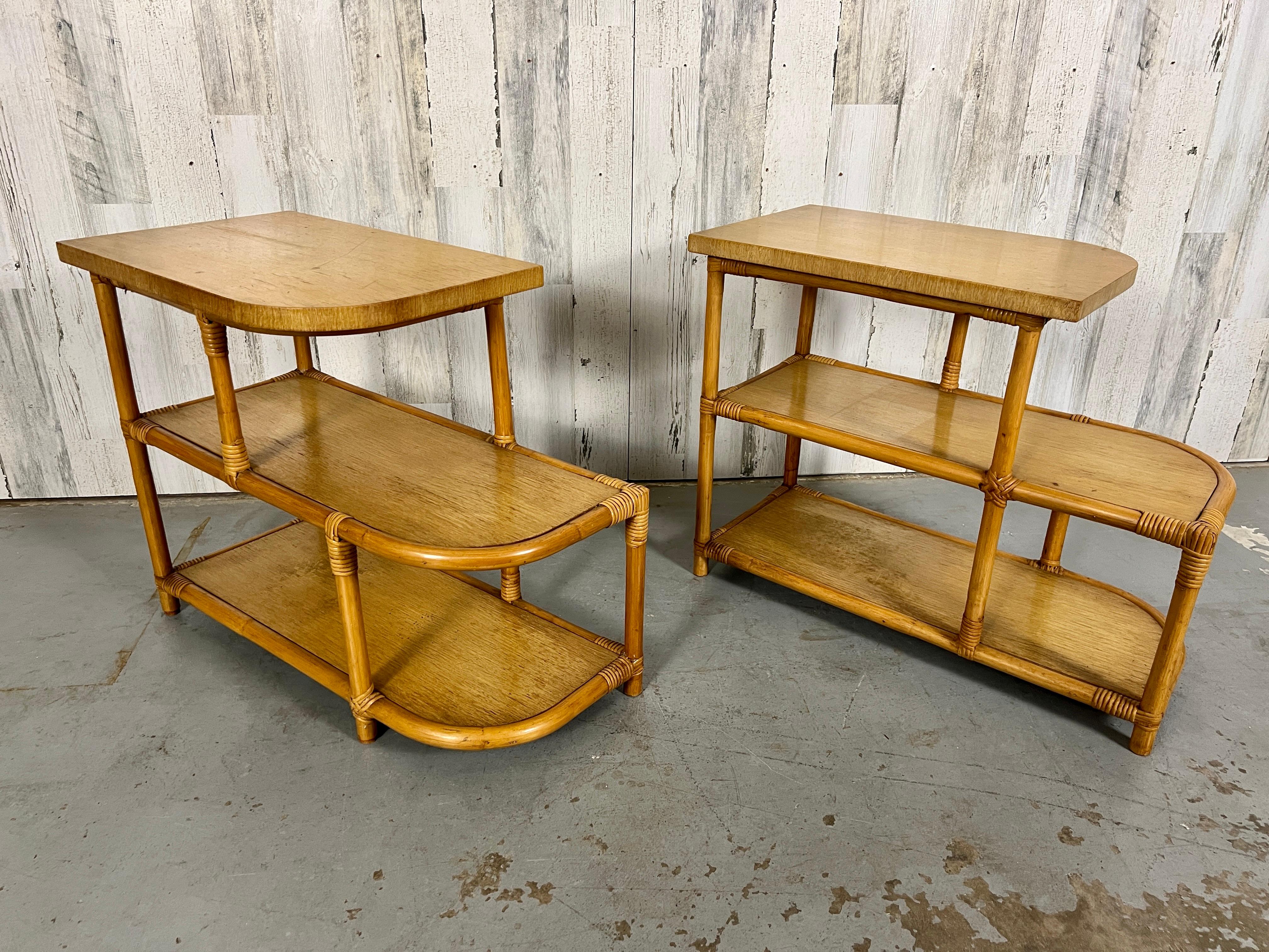 Petit end tables of rattan and bleached mahogany in the style of Paul Frankl.
Classic 1950's rounded design two tiered tables.