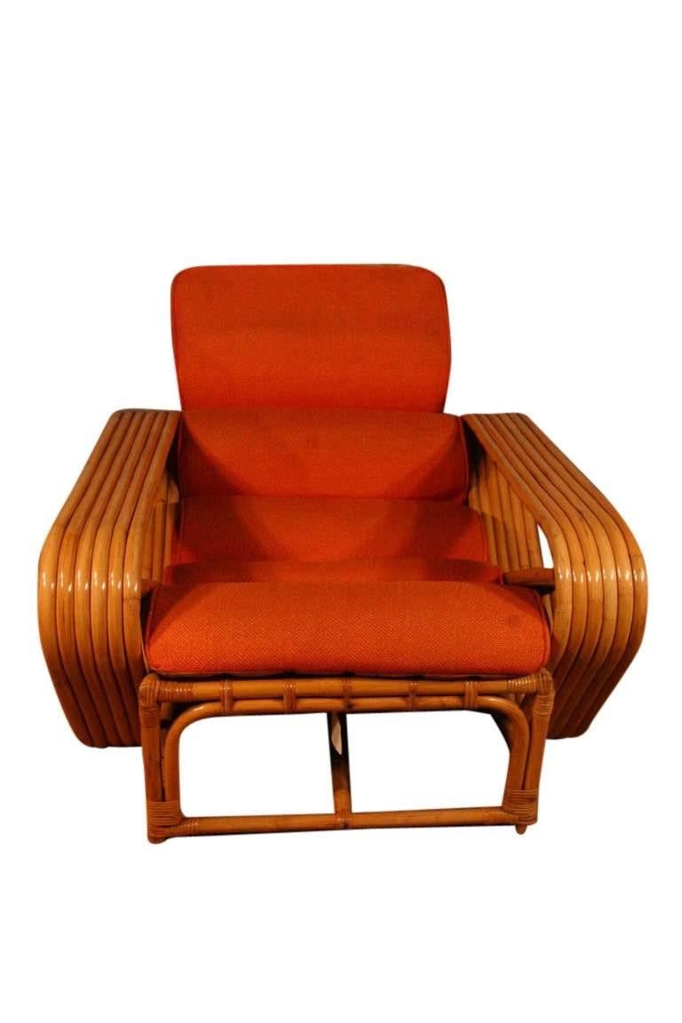 This six-strand, rattan lounge chair features square pretzel arms with a matching ottoman. 

Lounge chair- 29