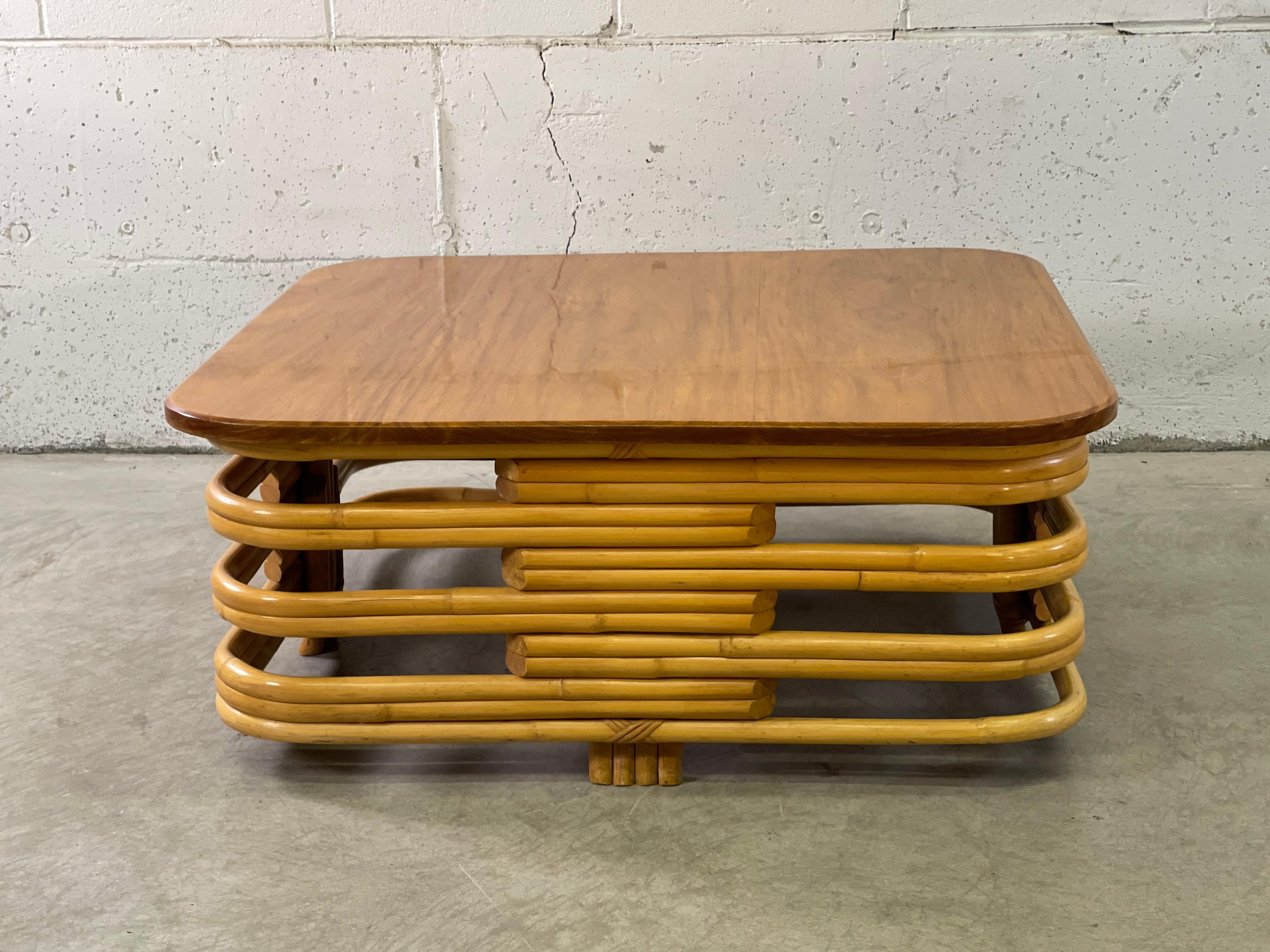 Vintage Paul Frankl style stacked rattan square coffee table with a mahogany top. No marks.