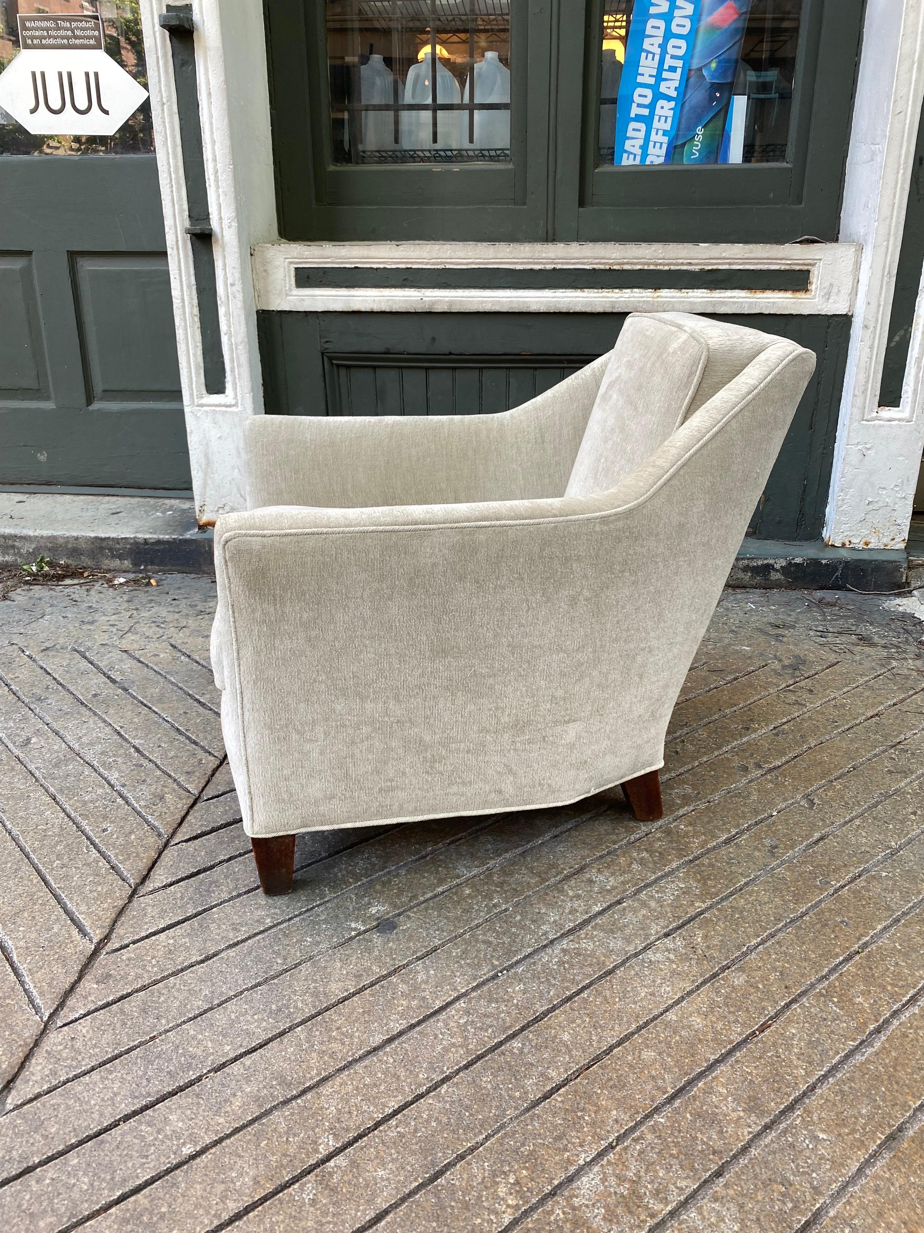 Paul Frankl Upholstered Lounge Chair. Chair dates to the late 1920's or early 30's. Great small scale design with a Cubist Influence. Newly redone in a cream velvet. From the warehouses of Mid-Century Dealer Andy Lin! Pictured in Frankl's Book from