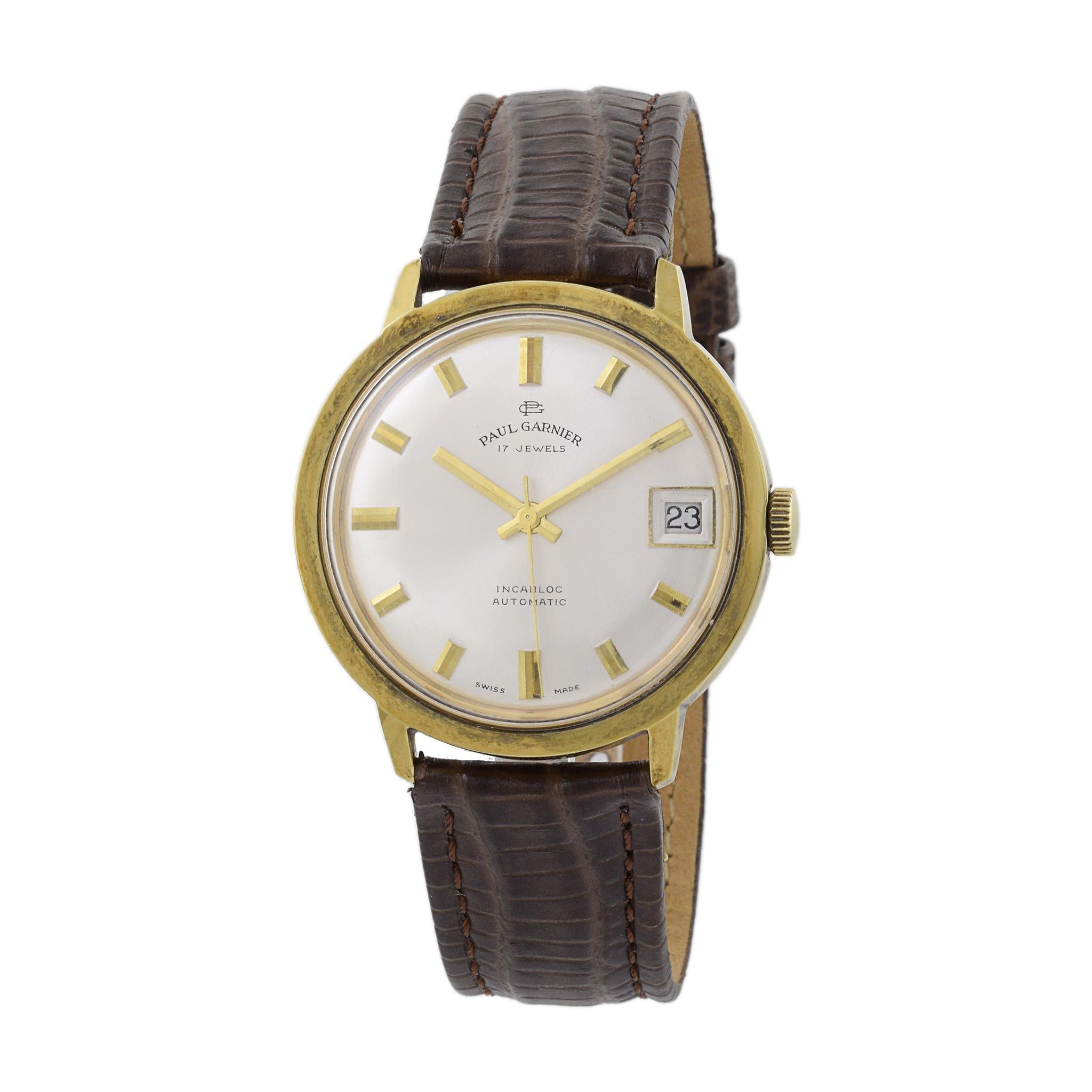 This is a 1970's Paul Garnier automatic calatrava. This watch is powered by a 17 jewel automatic Felsa caliber 4462 movement. This Paul Garnier features a date function at 9 o'clock.

The case of this watch measures 35mm and is a screwback