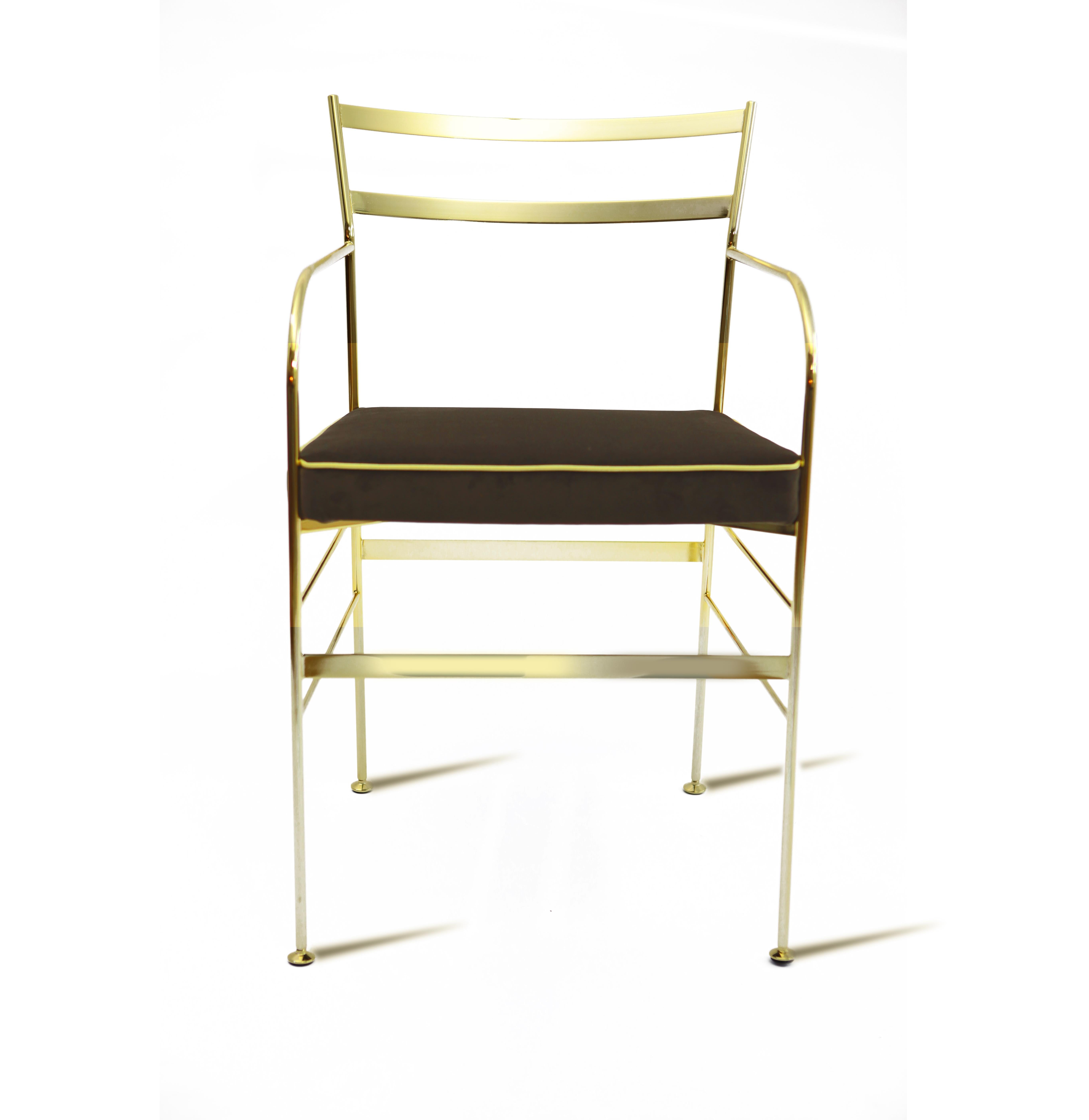 This striking chair has an iron structure covered with a 24-karat gold flash plating, and elegant galvanized brass feet. The fabric of seat is velvet polyester stein proof, soft touch (20 colors).
 