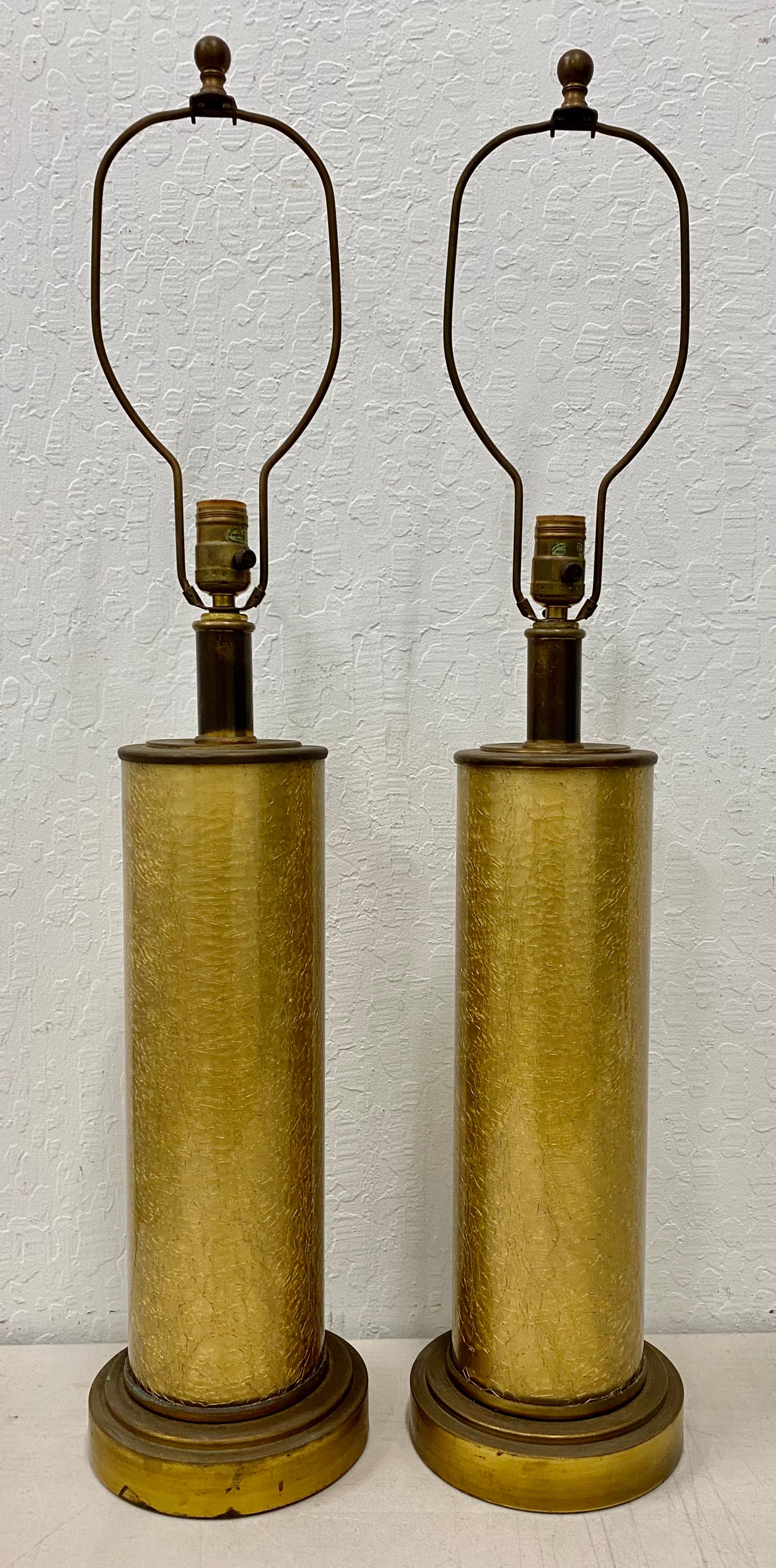 Paul Hanson Crackled (Foil) glass lamps with original shades, circa 1950

Absolutely stunning pair of original Paul Hanson cylindrical glass lamps with crackled gold foil.

Each lamp measures 7