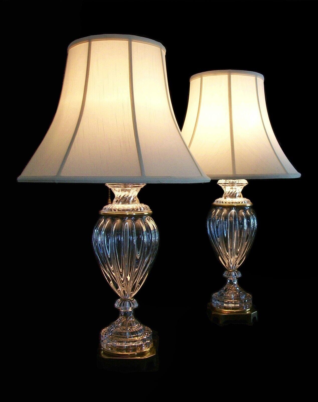 Paul Hanson - vintage pair of Baccarat style glass and brass table lamps - large size - featuring twisted and fluted glass bodies - solid brass bases - pull chain switches - vintage original bell shaped faux silk shantung shades - unsigned - United