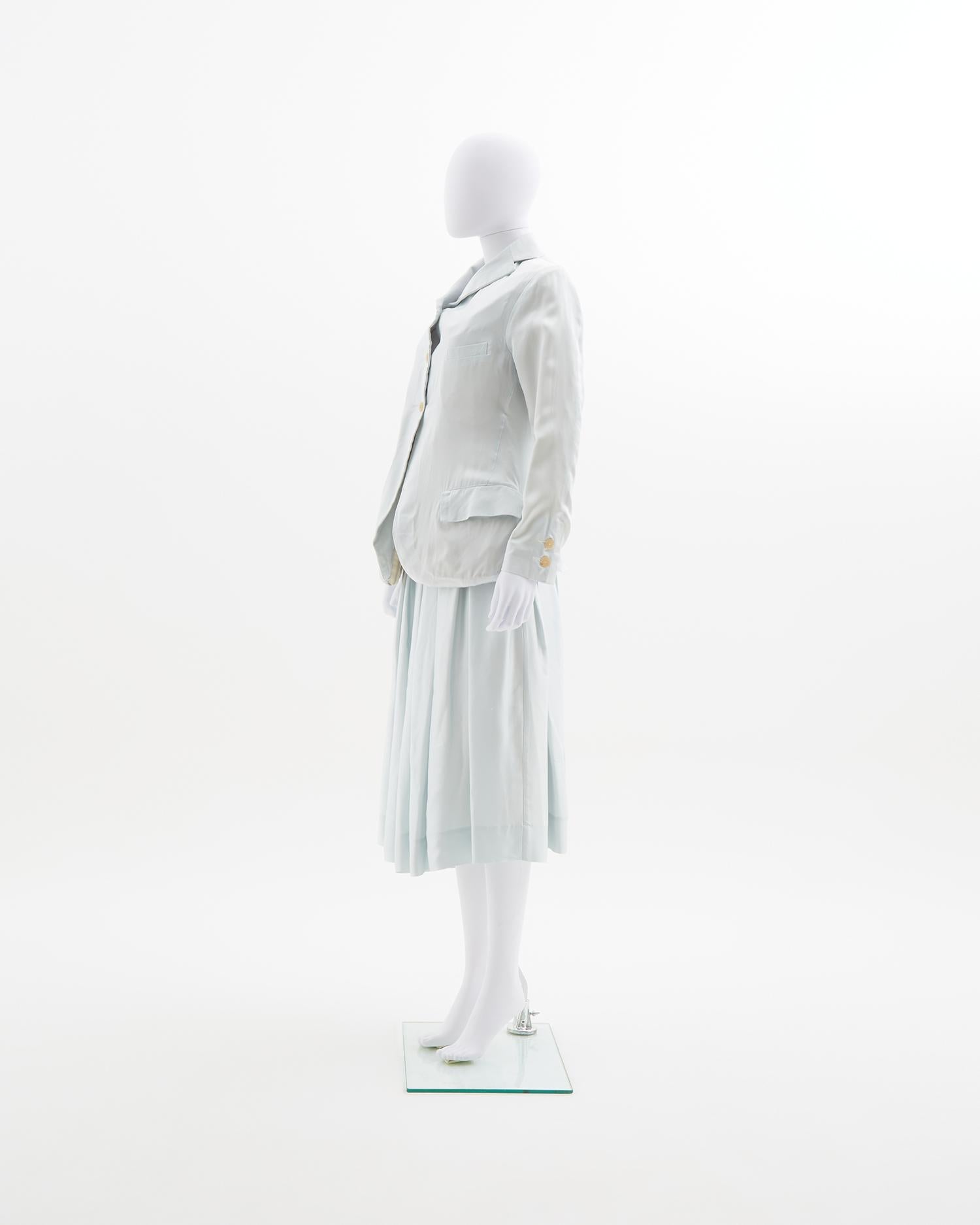 - Sugar paper silk set
- Sold by Skof.Archive 
- Single breasted button closure jacket 
- Padded jacket on the bottom 
- Ivory jacket lined with yellow and light blue cotton stripes 
- Circle skirt 
- Above knee-length skirt
- Hand washed 
- Hand