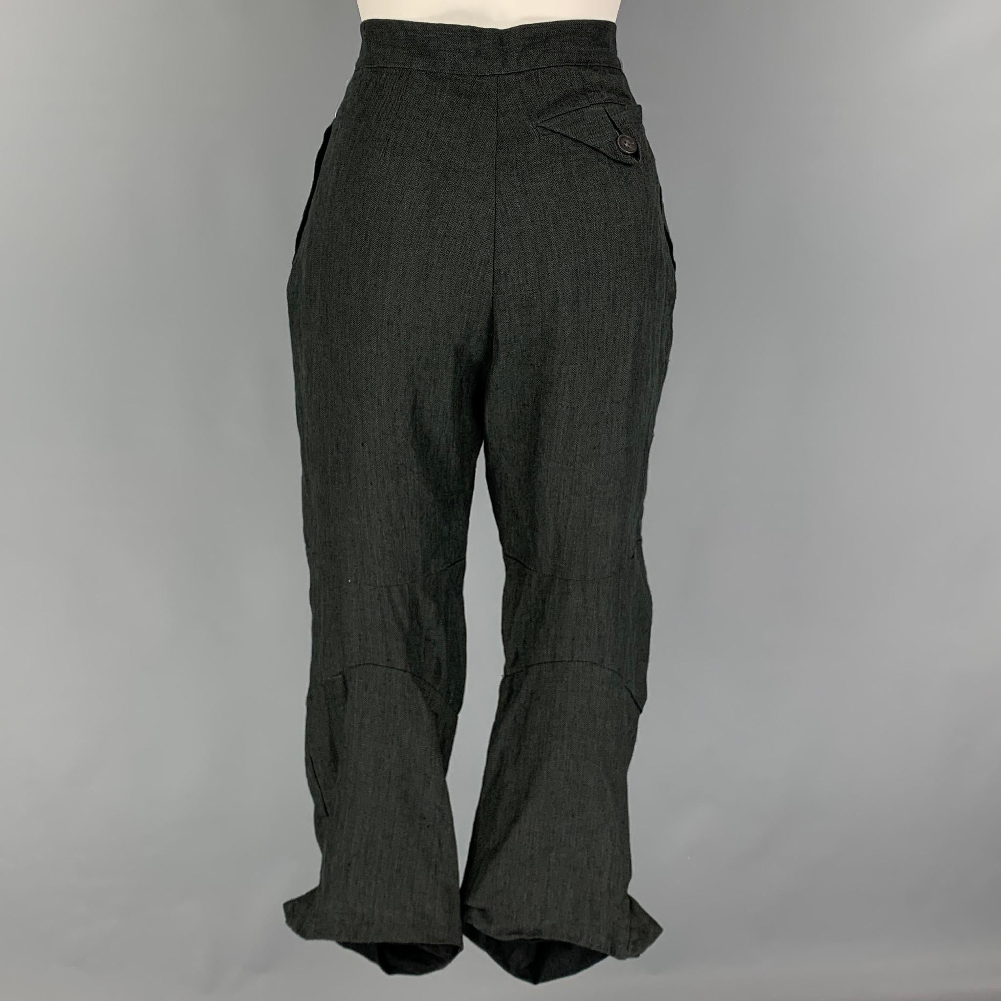 PAUL HARDEN dress pants comes in a gray linen featuring a high waisted style, cropped, and a button fly closure. 

Very Good Pre-Owned Condition.
Marked: S

Measurements:

Waist: 28 in.
Rise: 14 in.
Inseam: 23 in.
Leg Opening: 18 in.