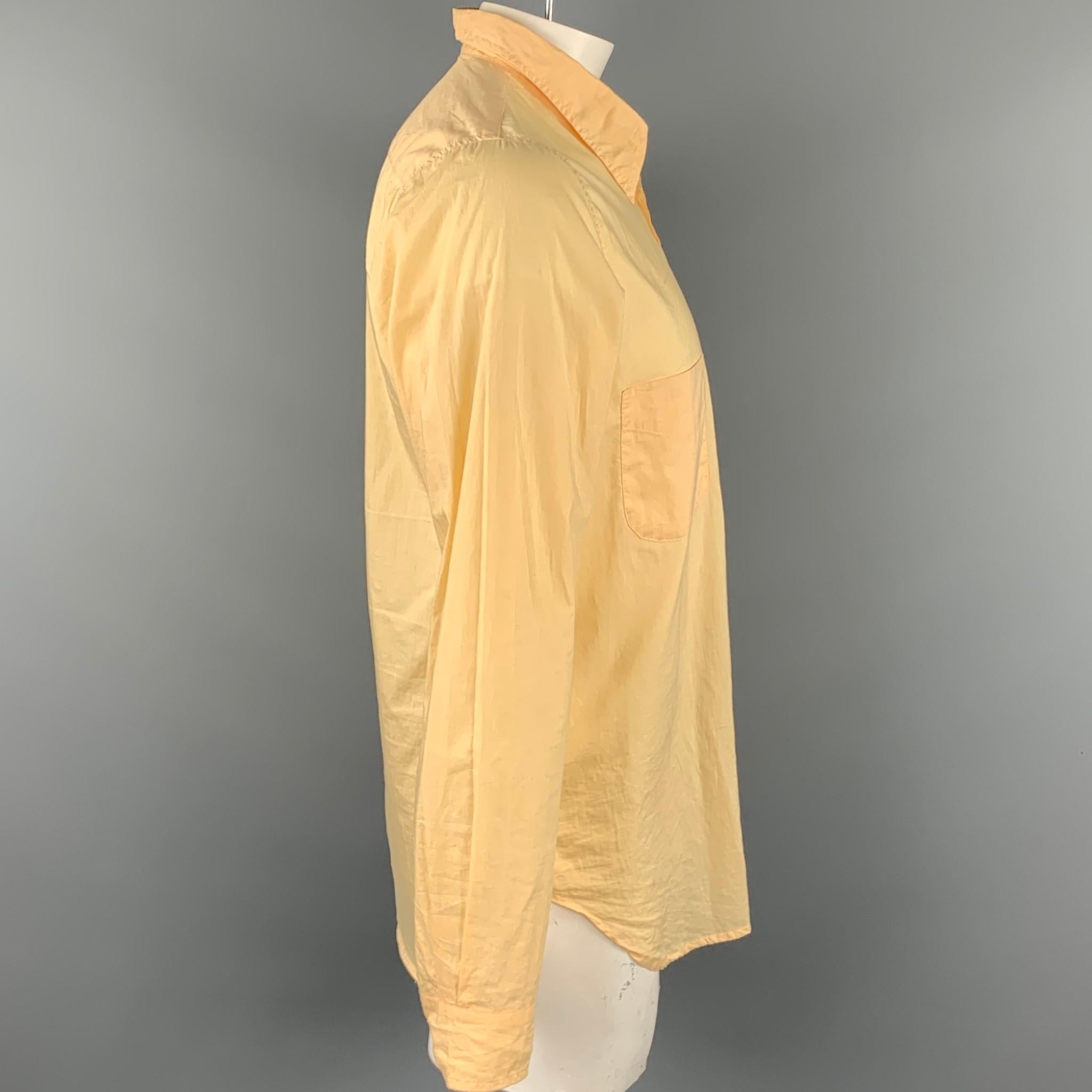 PAUL HARDEN long sleeve shirt comes in a yellow cotton featuring a button up style, patch pockets, and a spread collar. Handmade in Scotland.

Good Pre-Owned Condition.
Marked: XL

Measurements:

Shoulder: 16.5 in.
Chest: 44 in.
Sleeve: 28