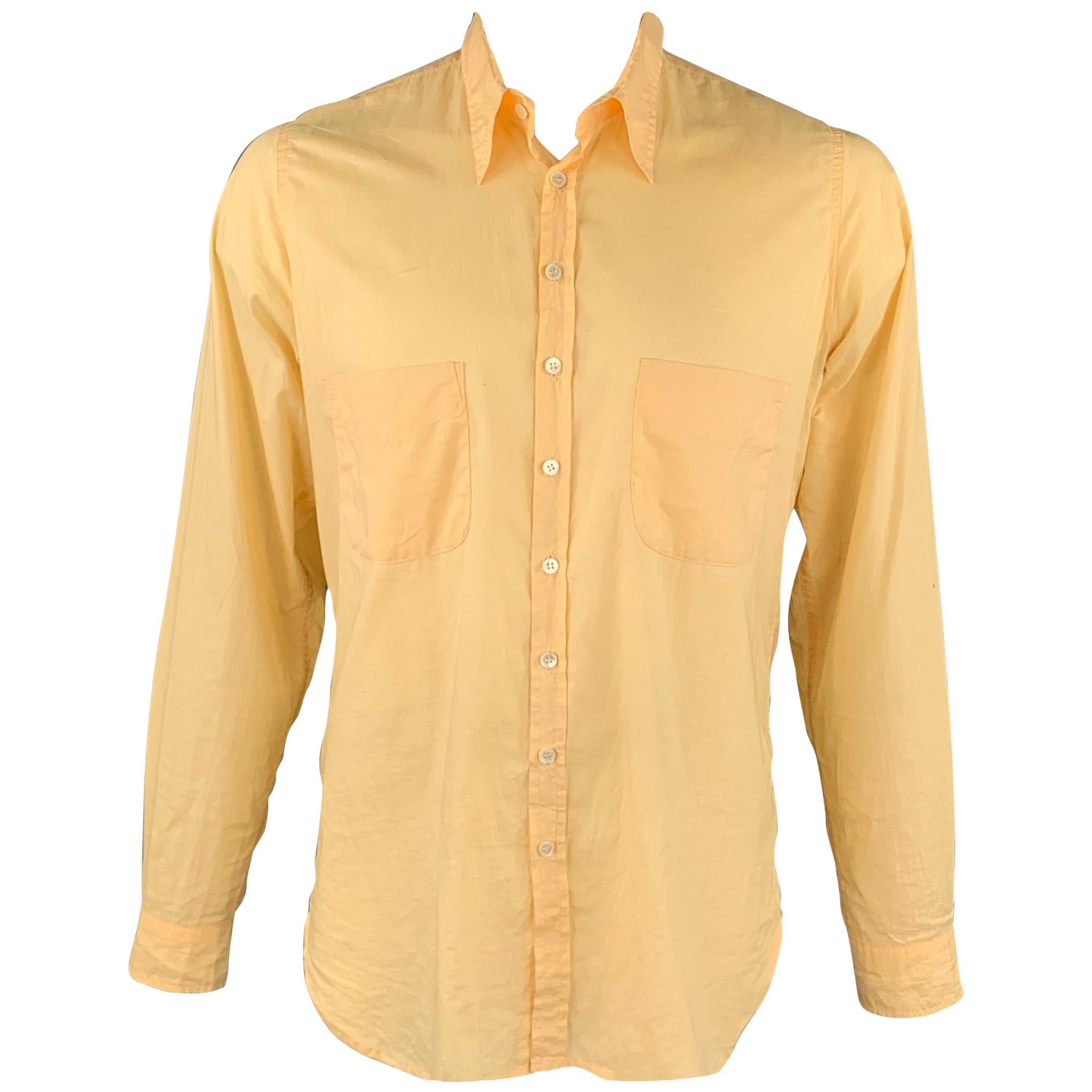 yellow long sleeve collared shirt