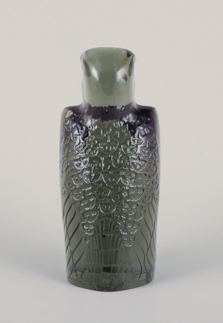 Late 20th Century Paul Hoff for Kosta Boda. Figurine of a falcon in smoked glass. 1975. For Sale