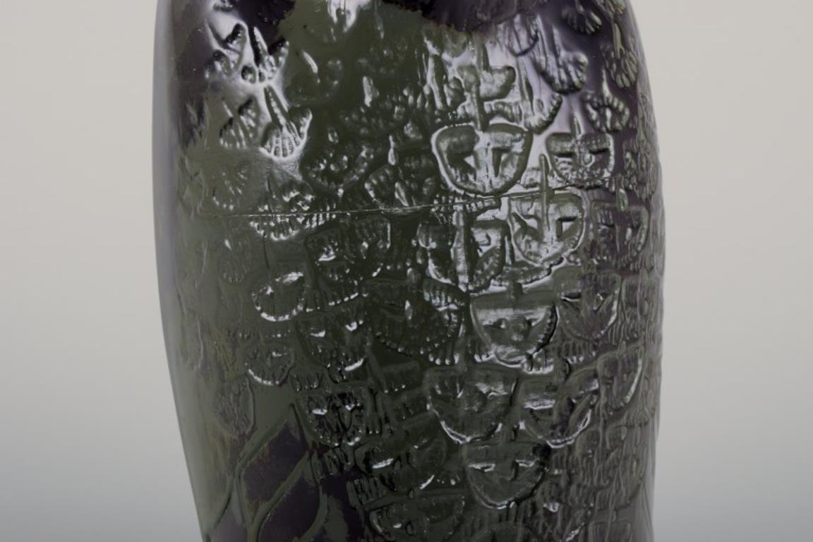 Art Glass Paul Hoff for Kosta Boda. Figurine of a falcon in smoked glass. 1975. For Sale