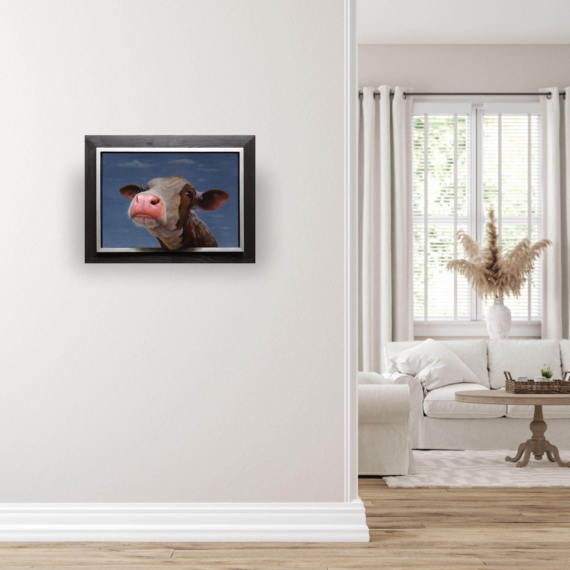 Esta excepcional obra de arte está actualmente expuesta y a la venta en la Galería de Arte Contemporáneo Signet y en Internet. La Vaca Marrón de Paul Jansen irradia sencillez y serenidad, centrándose en la pacífica mirada de una vaca sobre un cielo