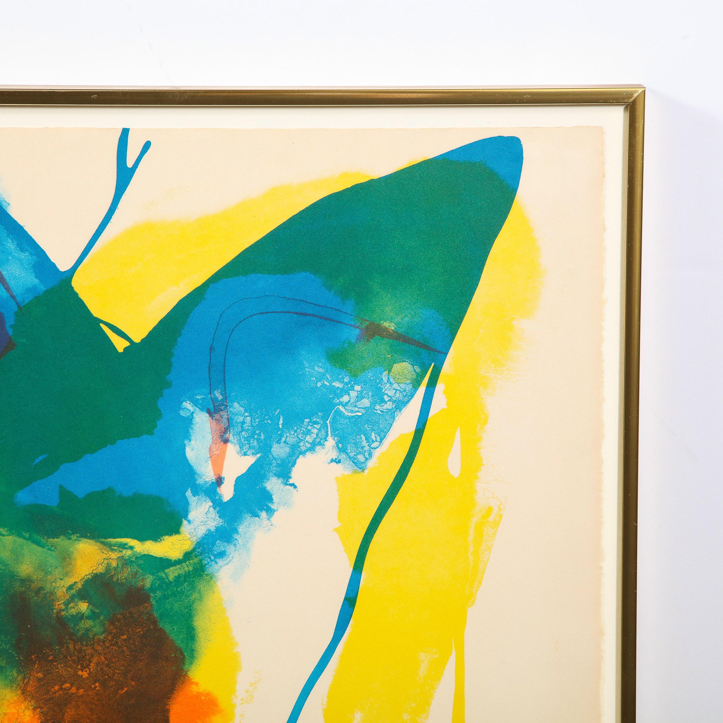 This stunning lithograph was realized by the esteemed 20th Century artist Paul Jenkins circa 1965. It offers an energetic and ebullient abstract composition in tones of tangerine, aquamarine and lemon rendered in nearly liquid strokes that appear to