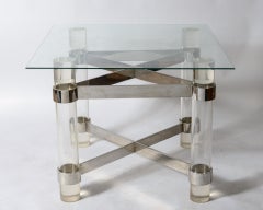 Mesa con estructura en cruz de acrílico y acero de Paul Jones