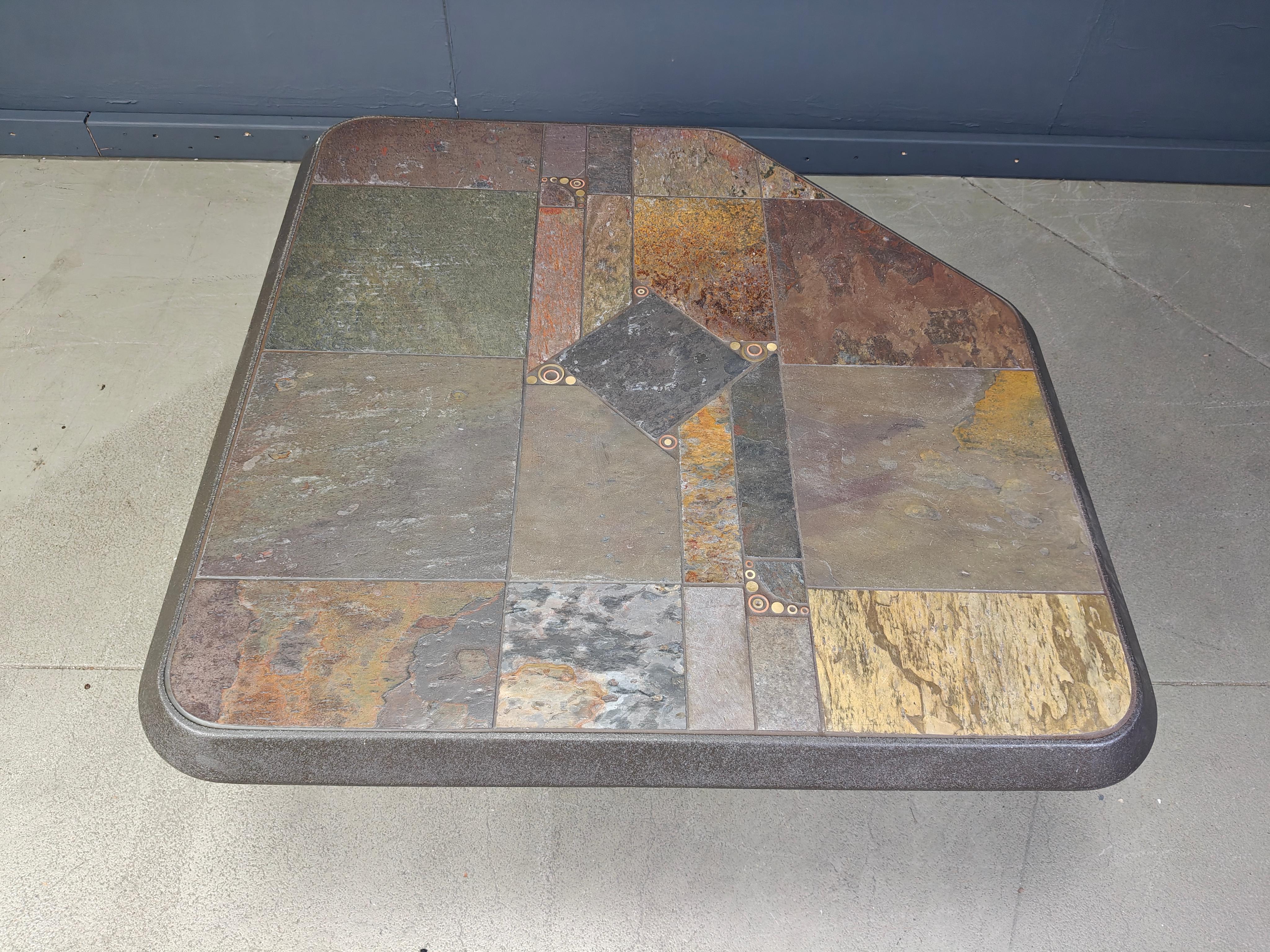 
Brutalist slate and natural stone top coffee table with inlaid copper and brass.

Good condition.

Very much in the style of Paul Kingma.

1980s - Germany

Height: 55cm 
Width x depth: 95cm

Ref.: 25081201

*All images are always part of the