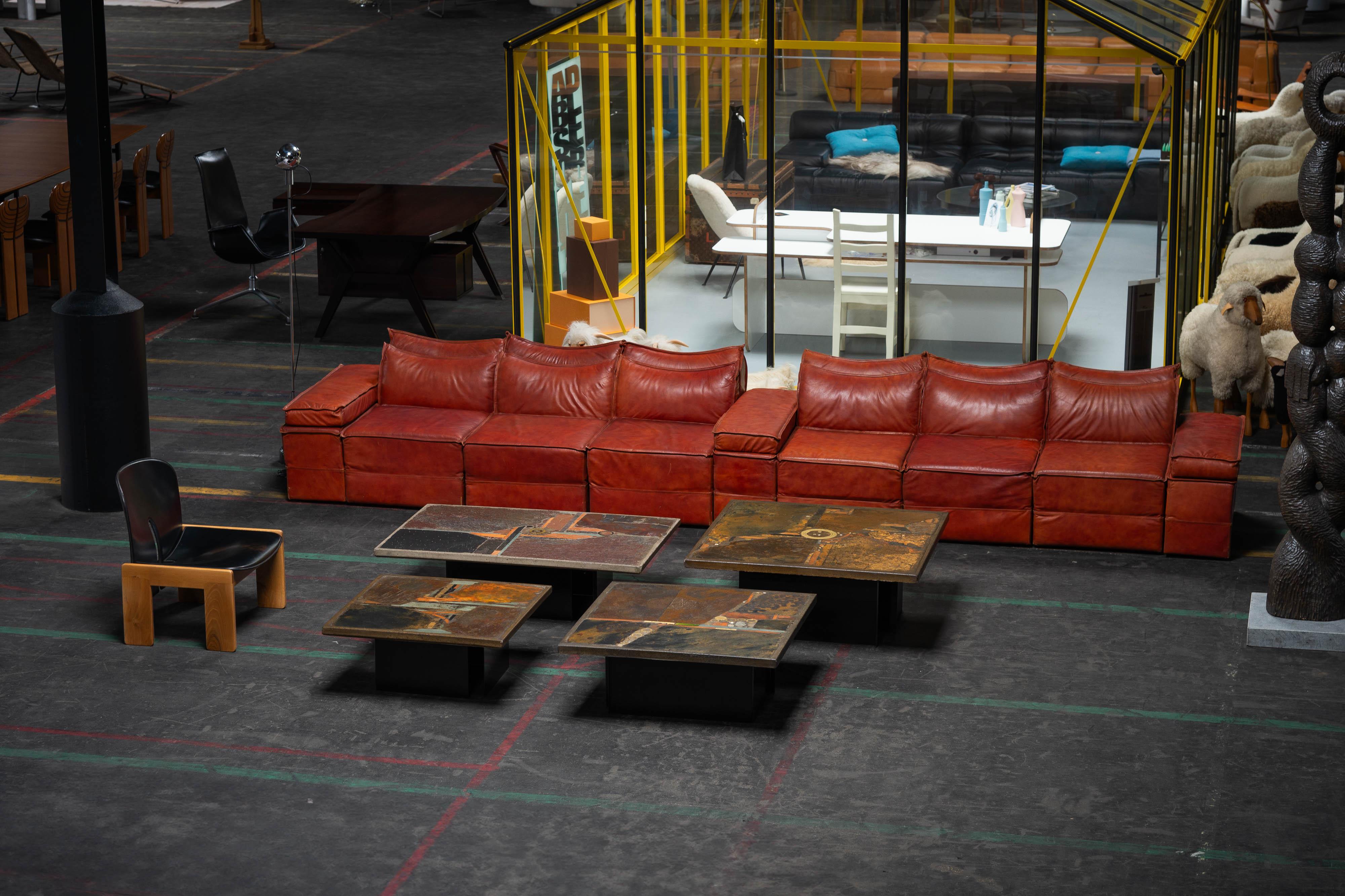 One of a kind coffee table made by Paul Kingma and made in his own Atelier, The Netherlands 1980. The square tabletop has beautiful features like the orange/red an yellow/gold bend tile pieces and the light grey and black pieces which create a nice