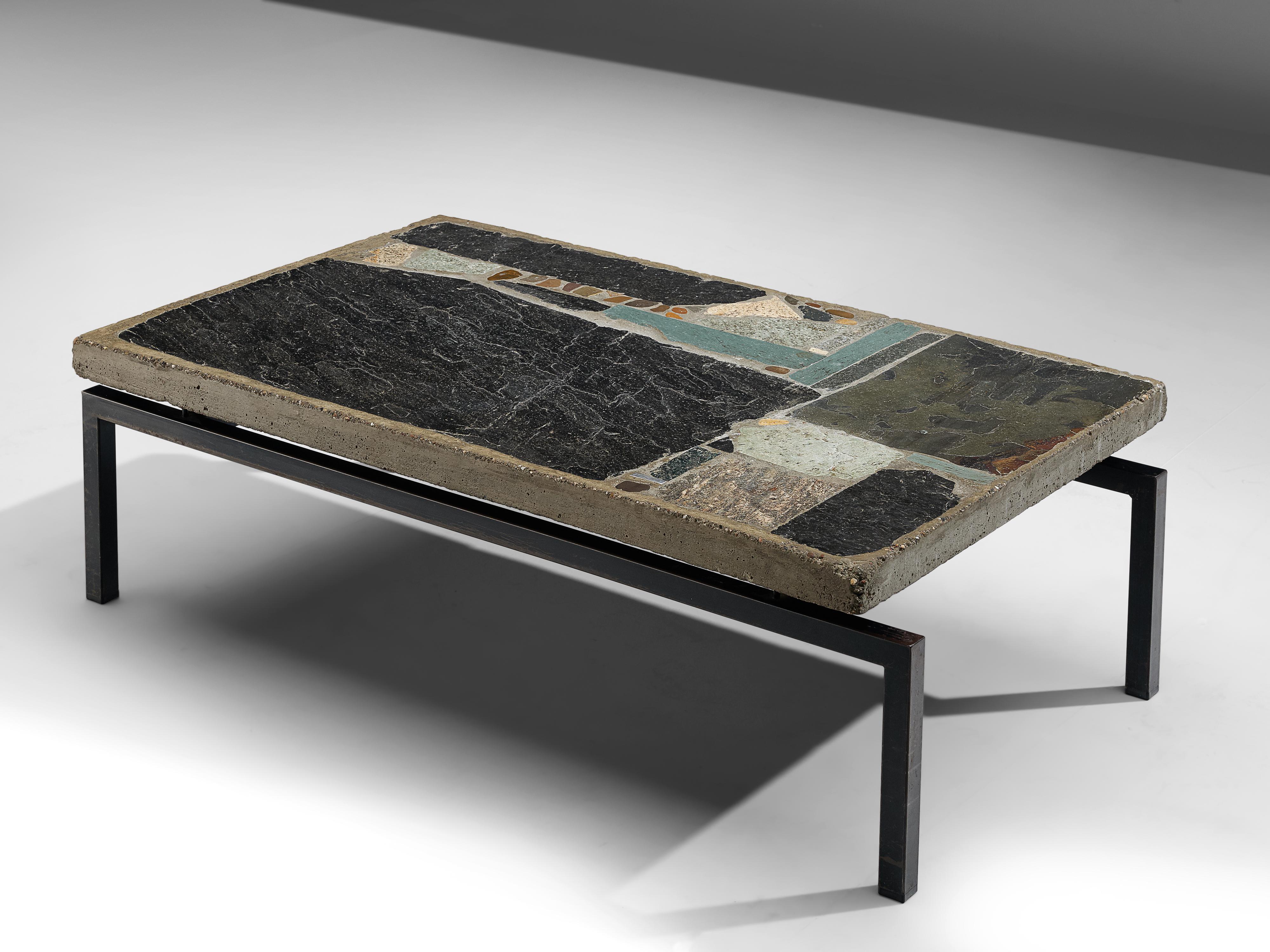 Paul Kingma, slate and ceramic tile coffee table, Netherlands, 1965

Abstract design of metals, slate and other stones, set into a concrete panel. The vibrant surface and the correspondence between different colors and materials forms a striking
