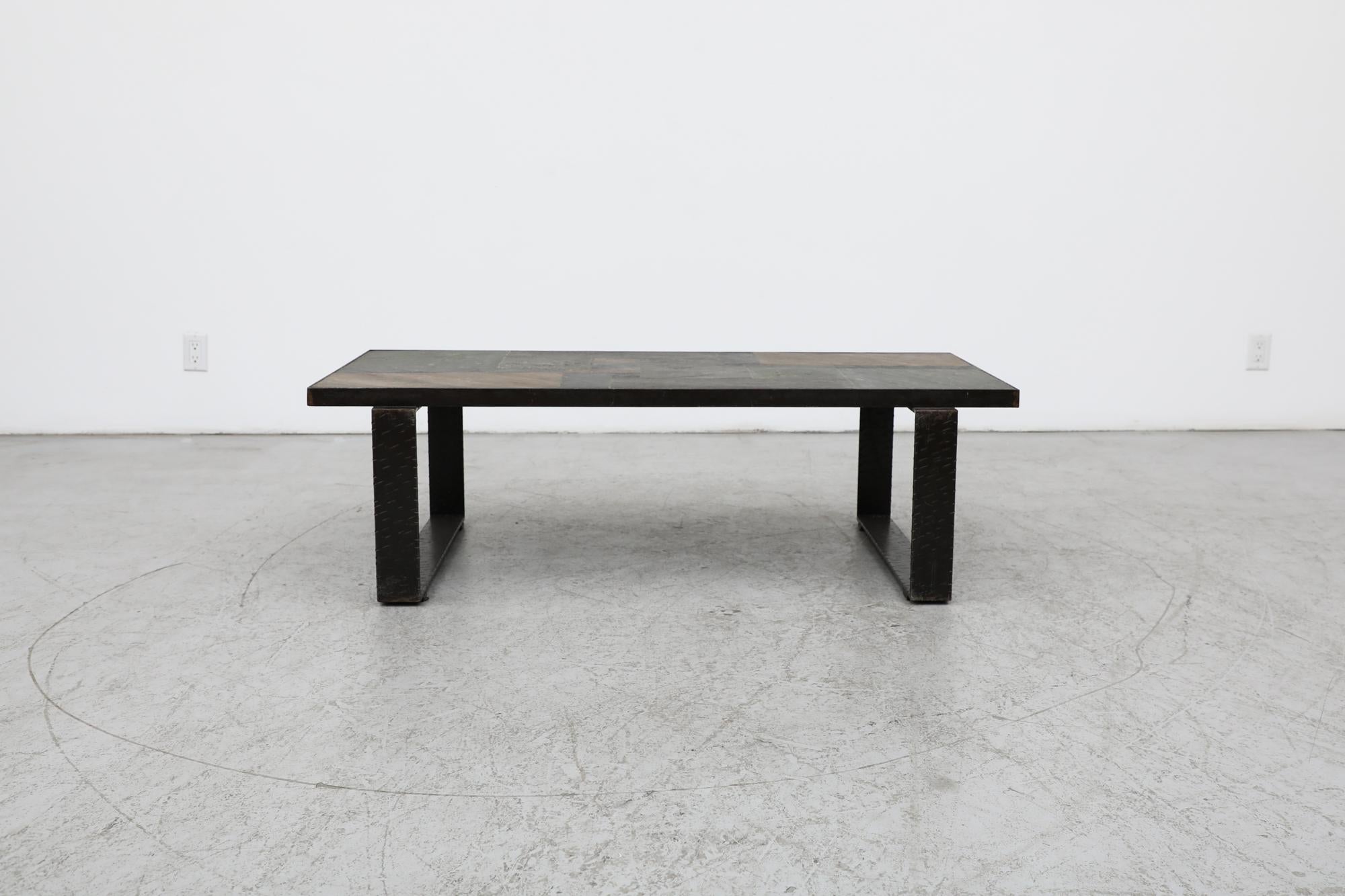 Mid-century, Dutch, 1960s, brutalist stone mosaic coffee table with thick flat steel square legs. Reminiscent of the designs of Paul Kingma as well as the tables created by Metaform in the same era. The stone top measures: 51.125