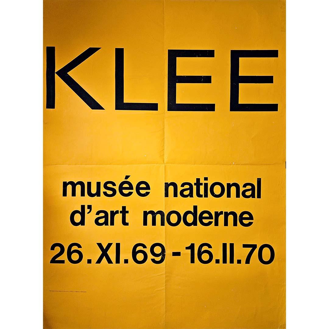 The circa 1969 original exhibition poster featuring the work of Paul Klee at the Musée National d'Art Moderne offers a captivating glimpse into the world of this influential artist. Paul Klee, renowned for his innovative approach to color and form,