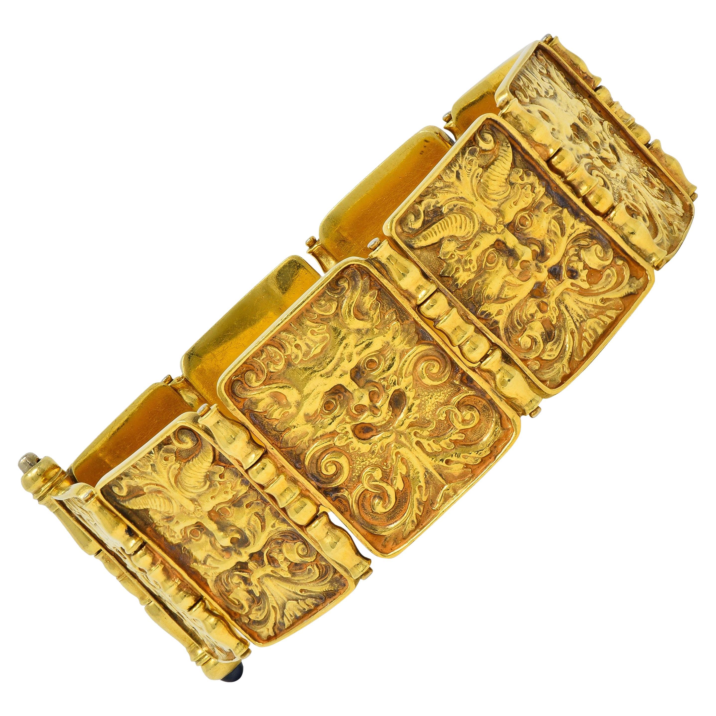 Paul Lantuch 18 Karat Yellow Gold Grotesque Mask Relief Panel Link Bracelet For Sale